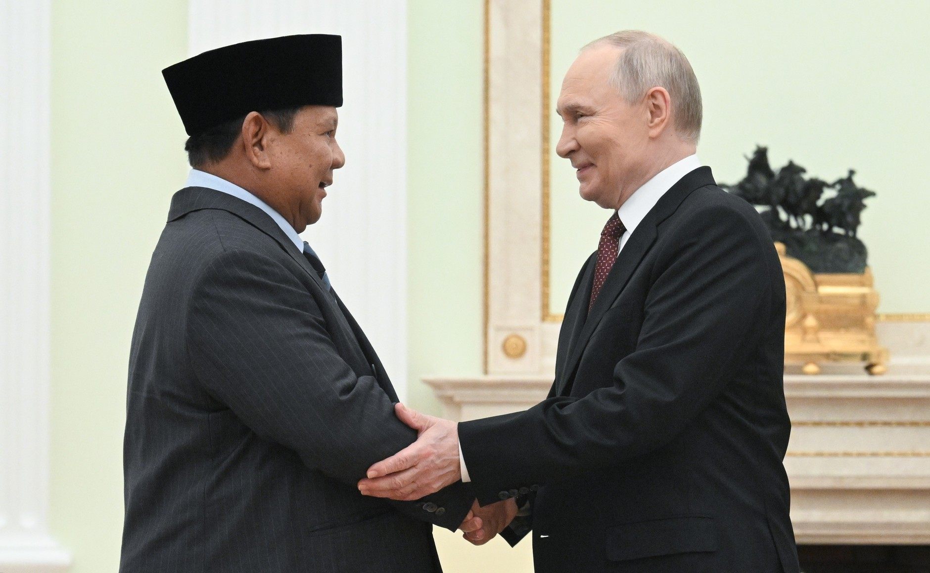 Russian President Vladimir Putin shakes hands with Indonesian President Prabowo Subianto ahead of their meeting at the Kremlin on Wednesday. Photo: dpa
