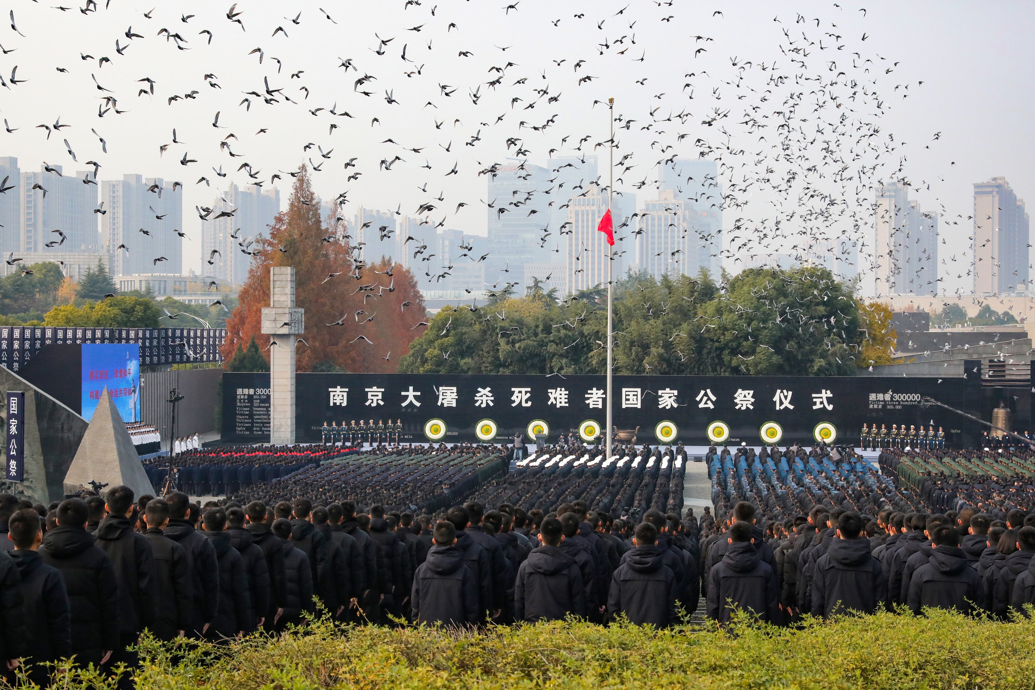 People attend the national memorial ceremony honouring the victims of the Nanking massacre of 1937 in Nanjing, Jiangsu province, on December 13, 2024. Photo: Getty Images