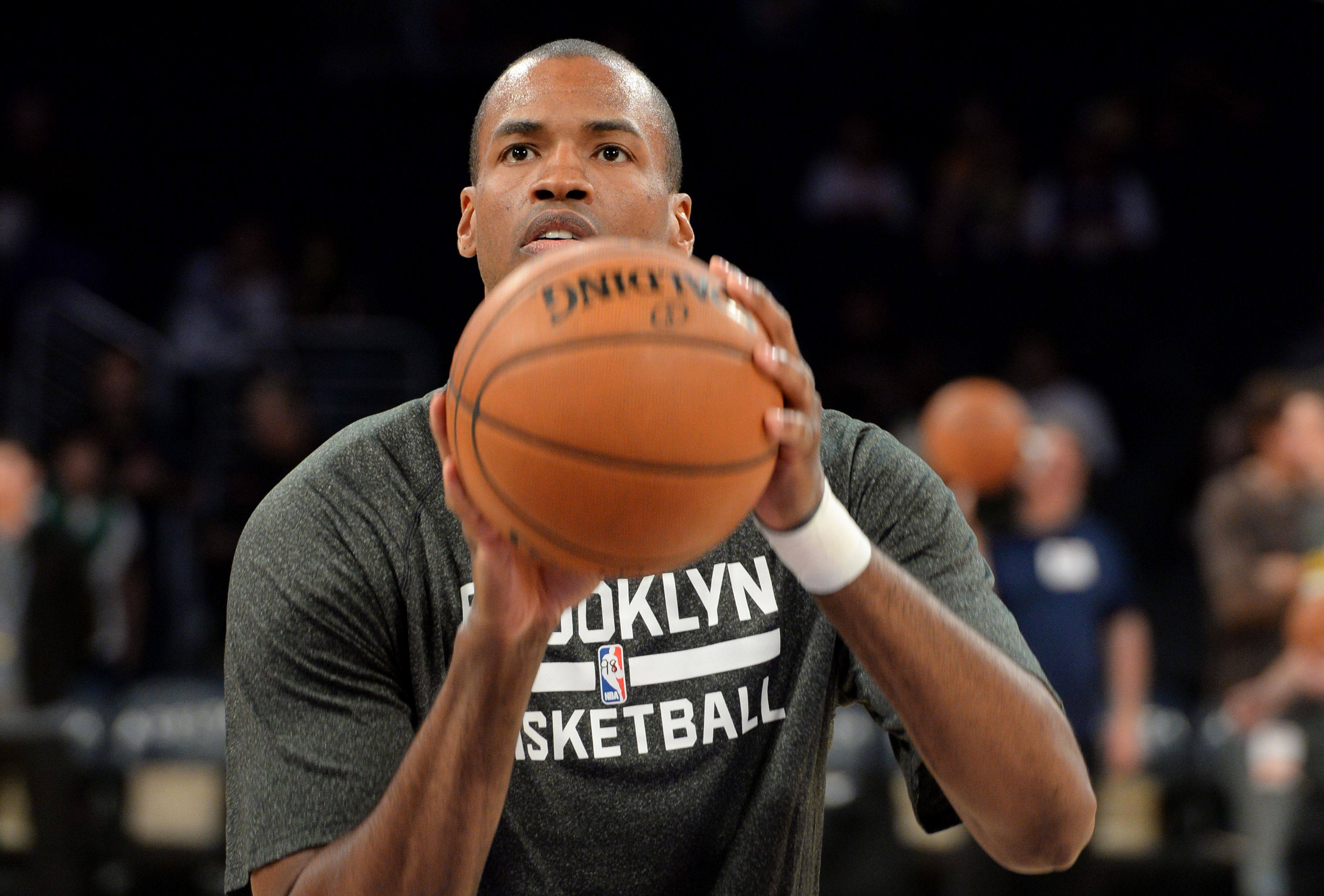 Jason Collins, then a player with the Brooklyn Nets, warmed up before a match against the Los Angeles Lakers at Staples Centre in Los Angeles, California in 2014. Photo: AFP