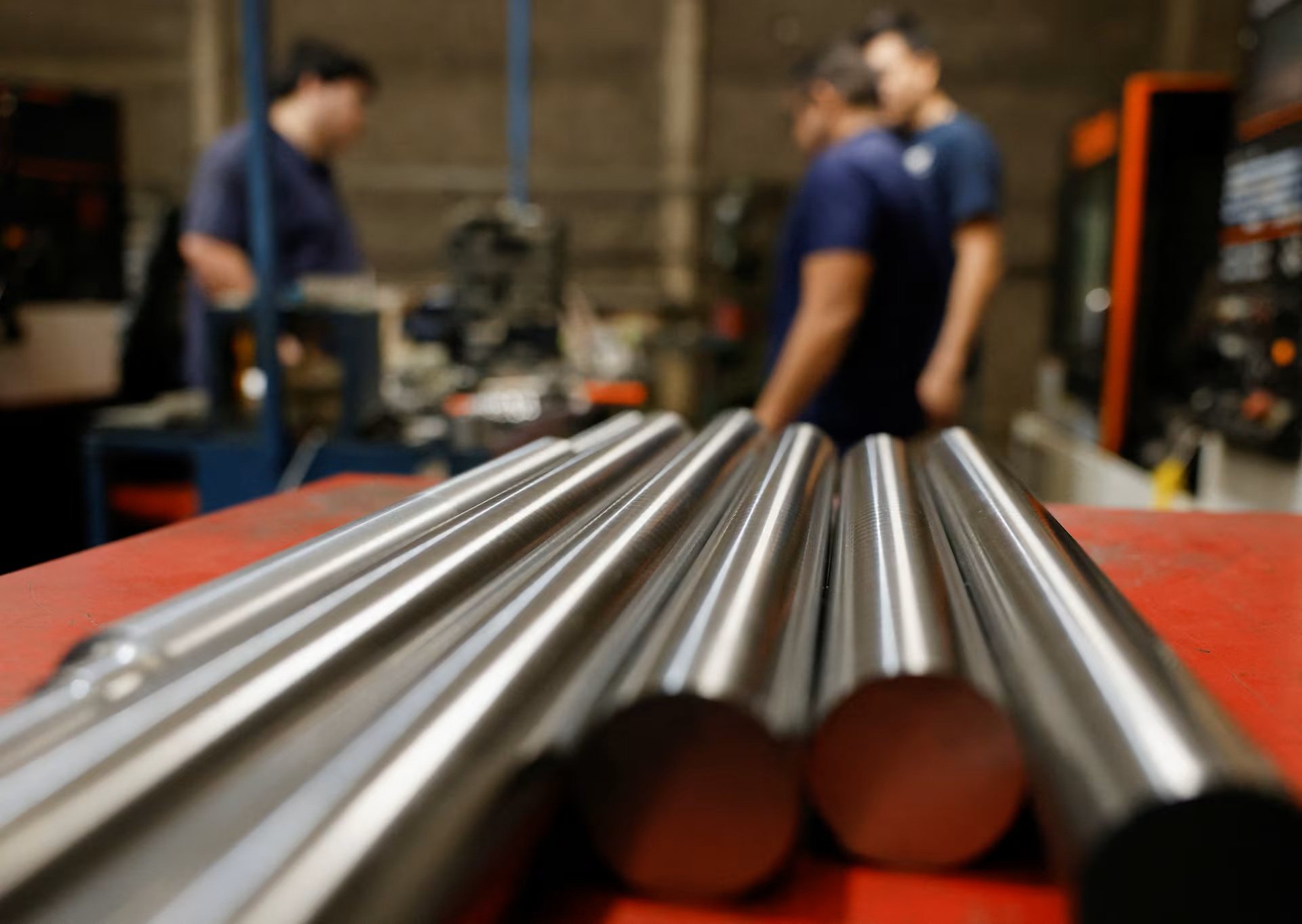 Workers at a metal-mechanical parts factory in Apodaca, Mexico. Photo: Reuters