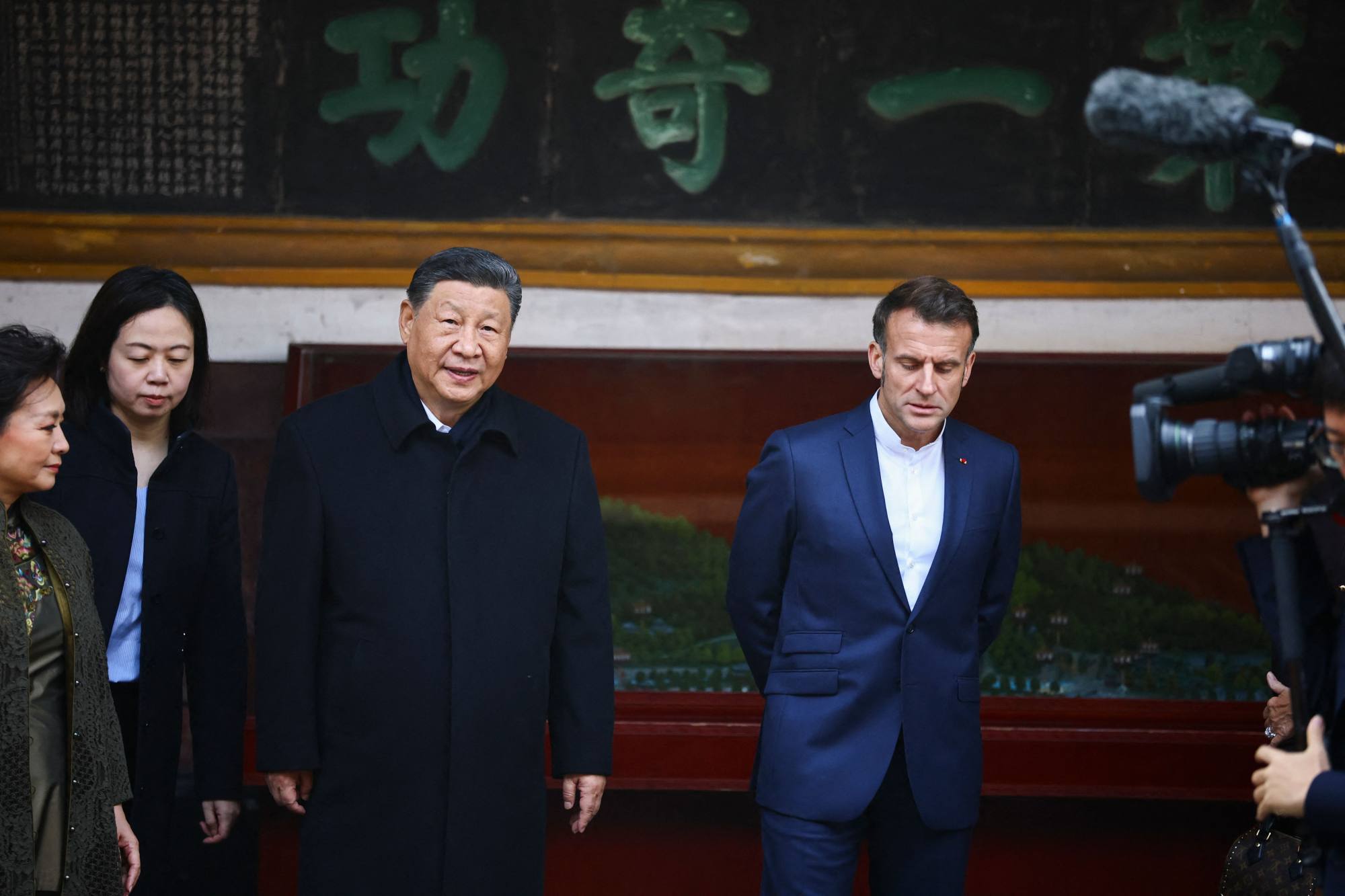 French President Emmanuel Macron (right) and Chinese President Xi Jinping tour the UNESCO-listed Dujiangyan site in China’s Sichuan province on December 5. Photo: AFP French President Emmanuel Macron (right) and Chinese President Xi Jinping tour the UNESCO-listed Dujiangyan site in China’s Sichuan province on December 5. Photo: AFP
