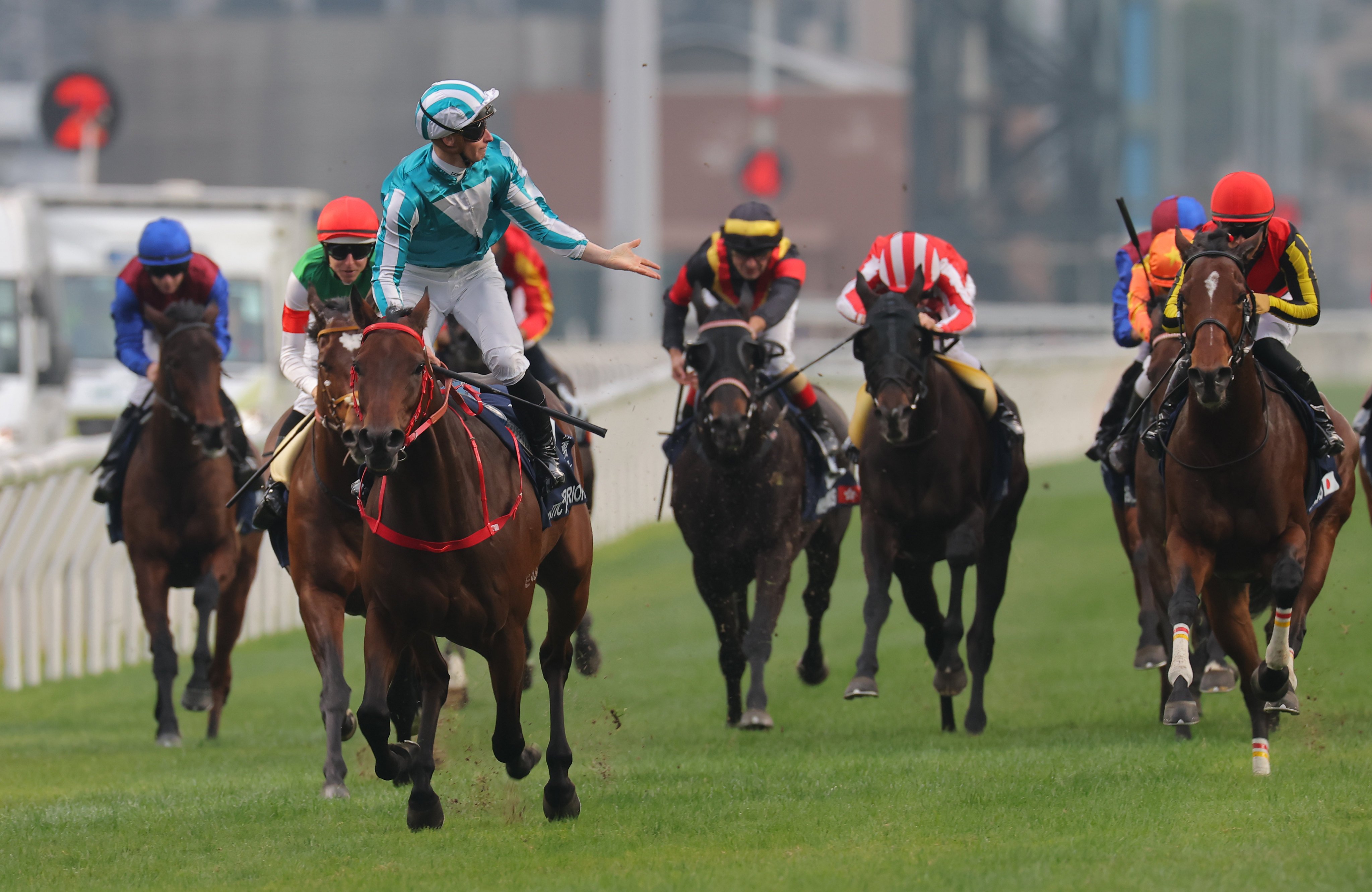 James McDonald laps it up as Romantic Warrior secures a third Hong Kong Cup success. Photo: Kenneth Chan