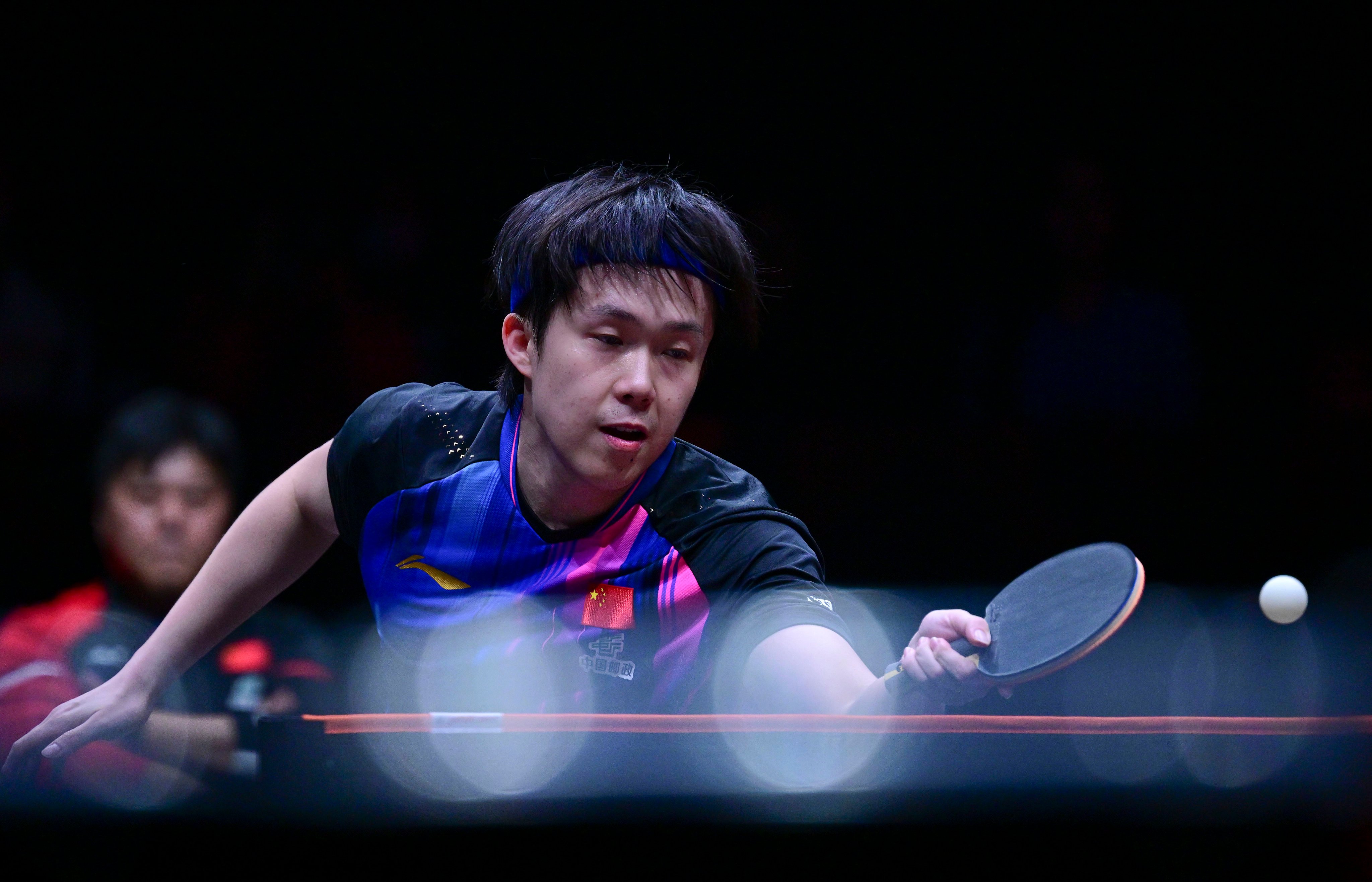 China’s Wang Chuqin hits a return during his singles quarter-final against Alexis Lebrun of France at the WTT Finals at the Hong Kong Coliseum on Friday. Photo: Xinhua
