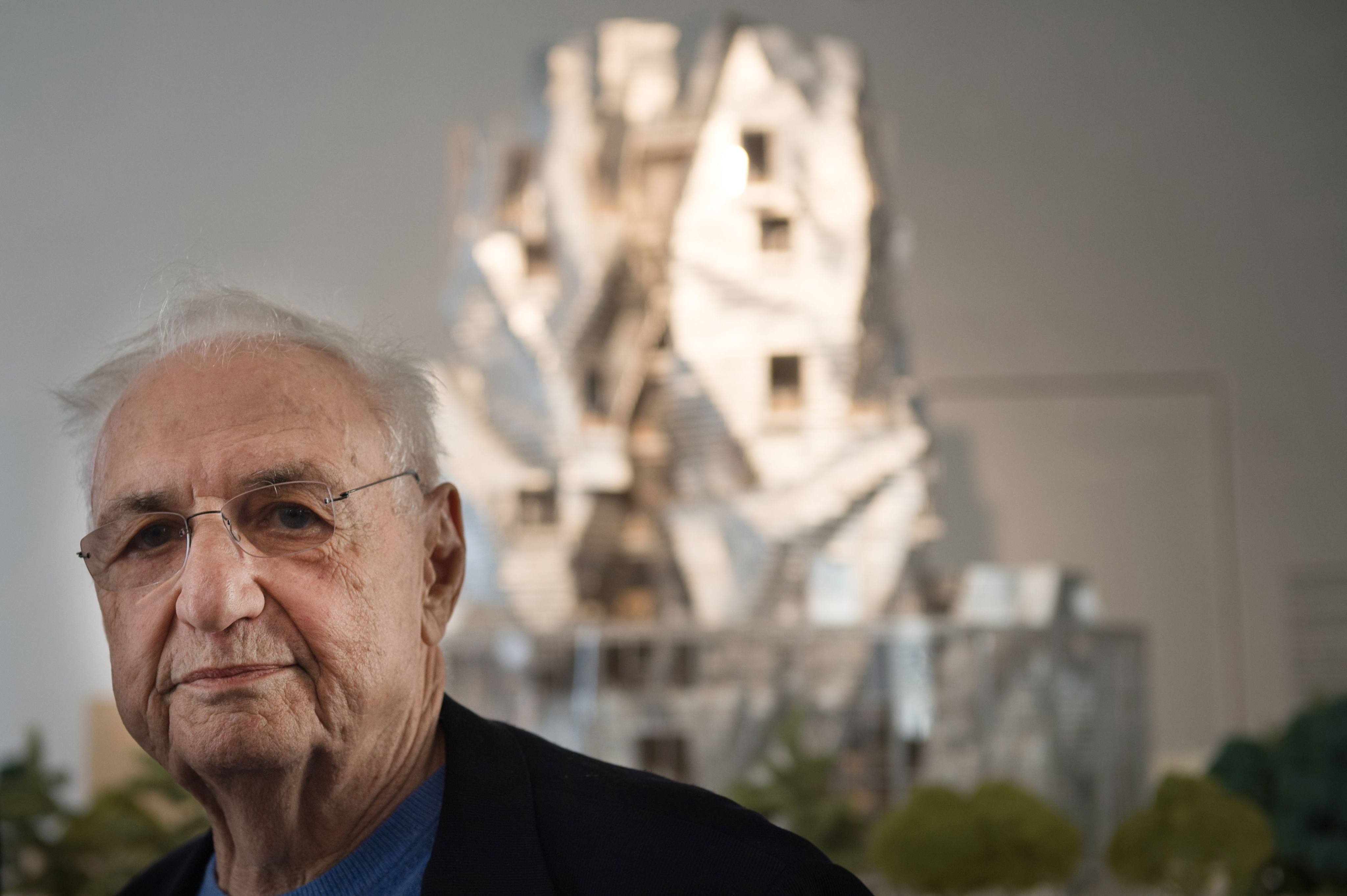 Architect Frank Gehry at a press conference in front of a model of Luma Arles in Arles, France, in 2014. Photo: AFP