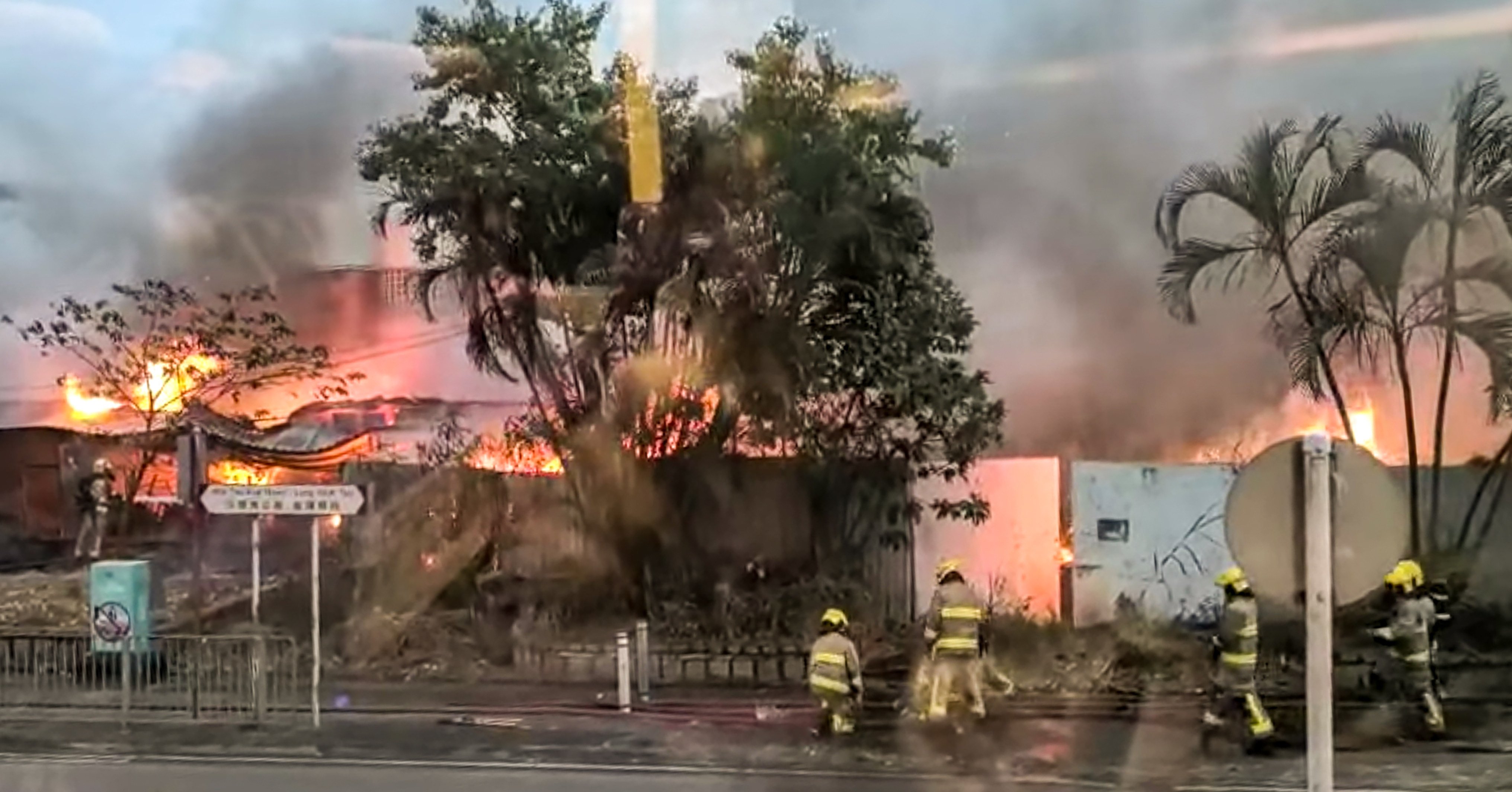 Firefighters respond to the blaze that erupted at a warehouse in Ma Liu Shui San Tsuen on Saturday. Photo: Facebook / Bosco Chu