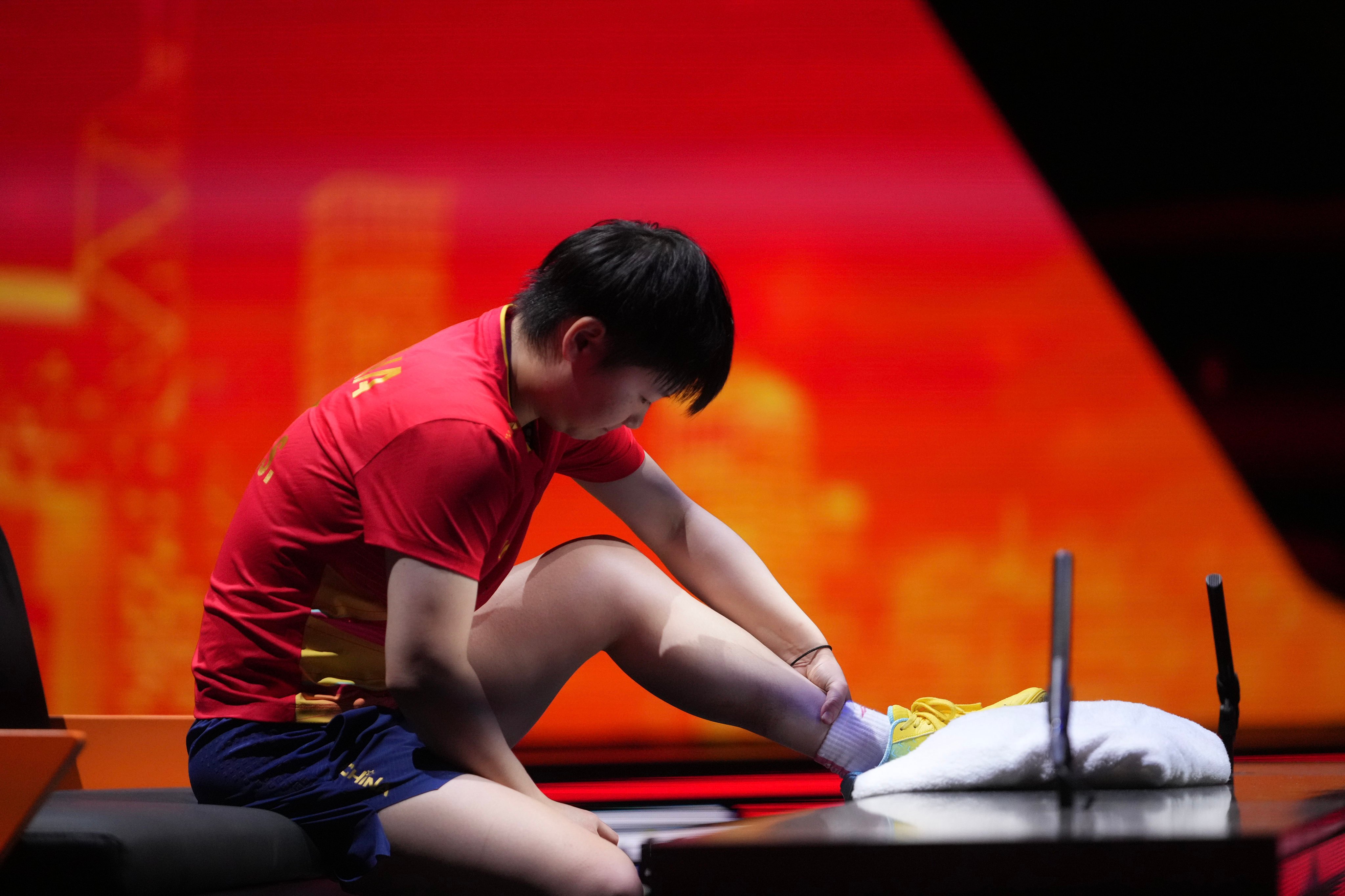 Sun Yingsha sat through several medical time-outs on Saturday before finally withdrawing from the semi-final. Photo: Xinhua