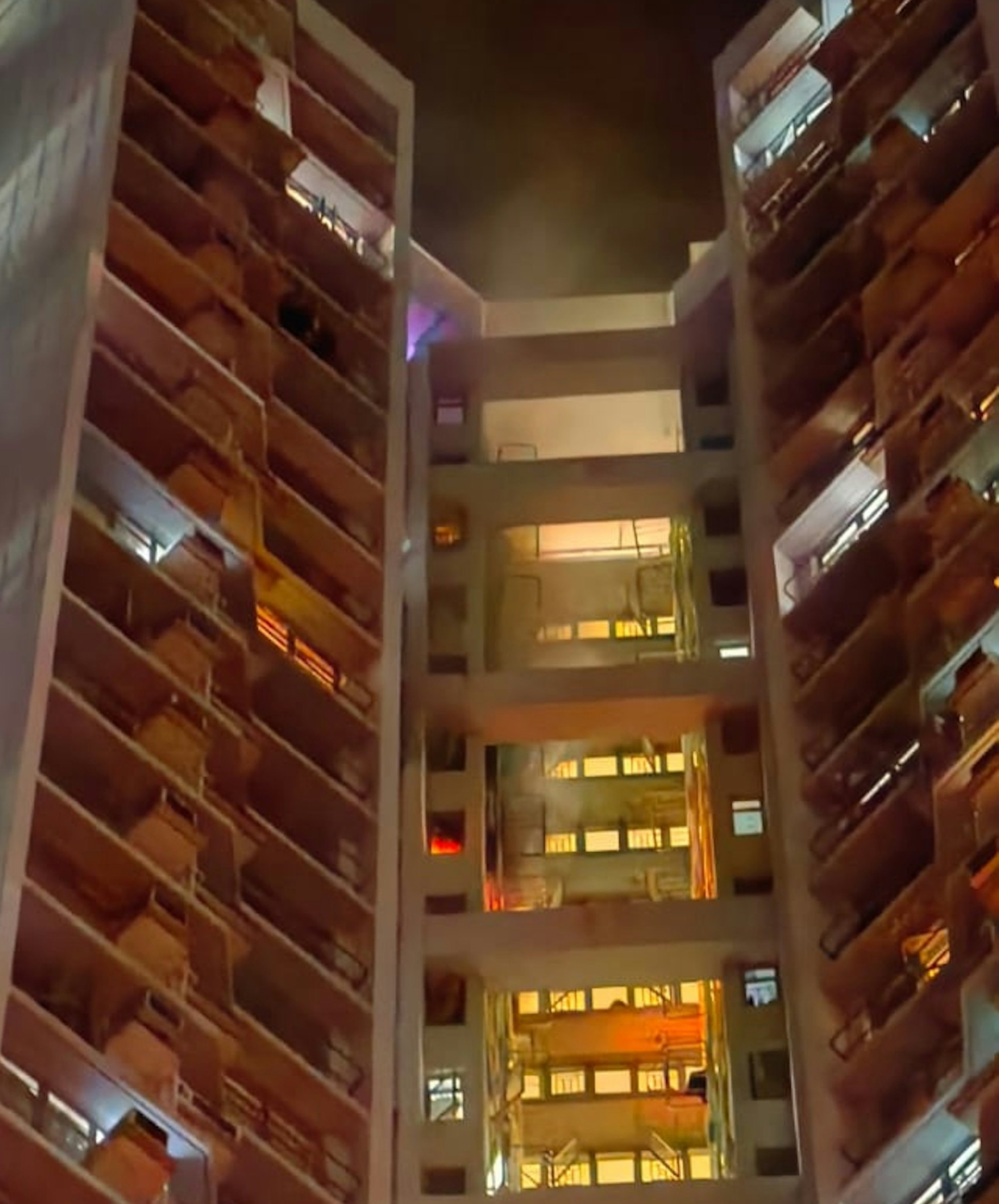 Flames are seen at the flat in Tin Shui Wai. The occupant sustained burns on 20 per cent of his body. Photo: Handout