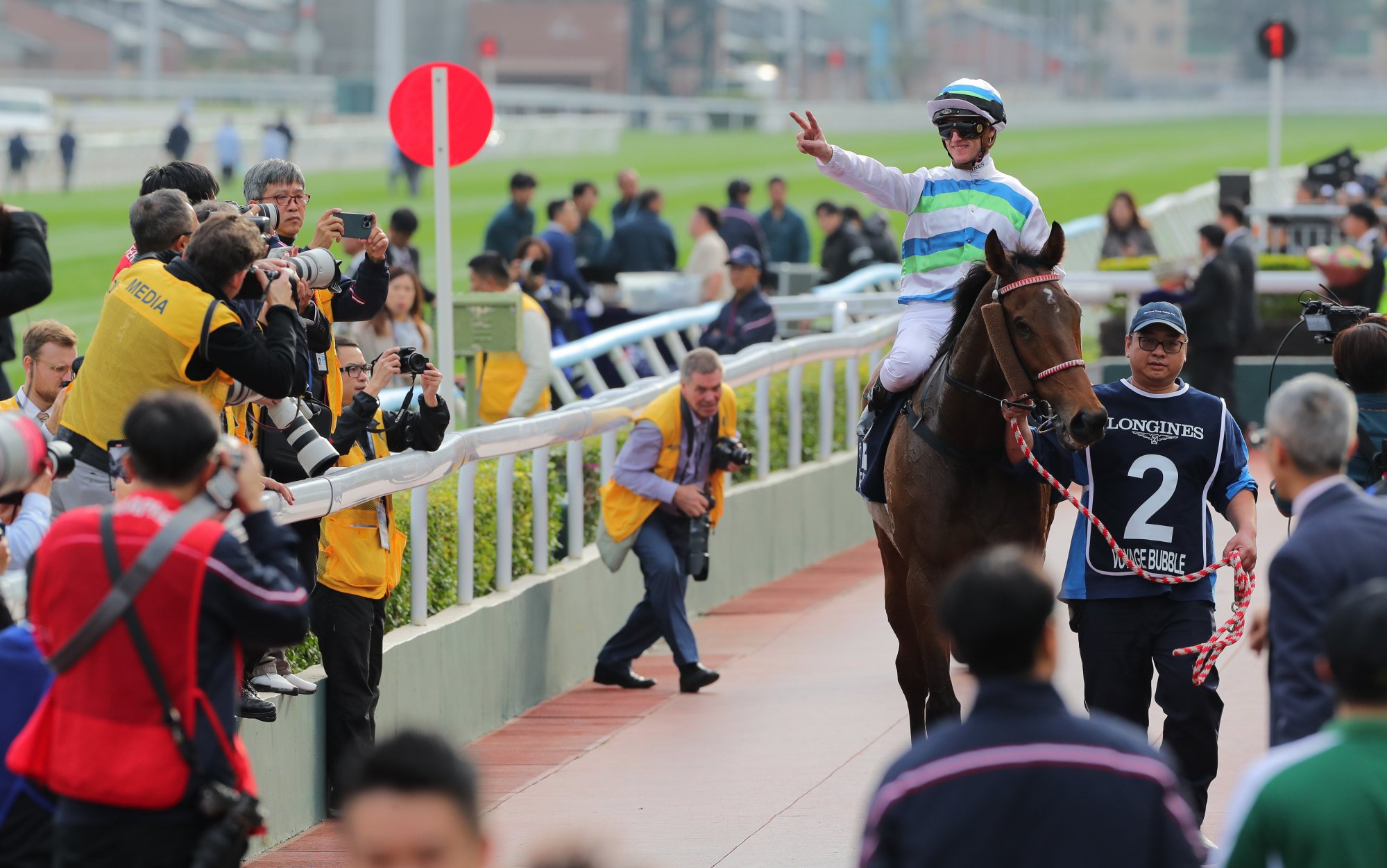 Zac Purton celebrates on Voyage Bubble.