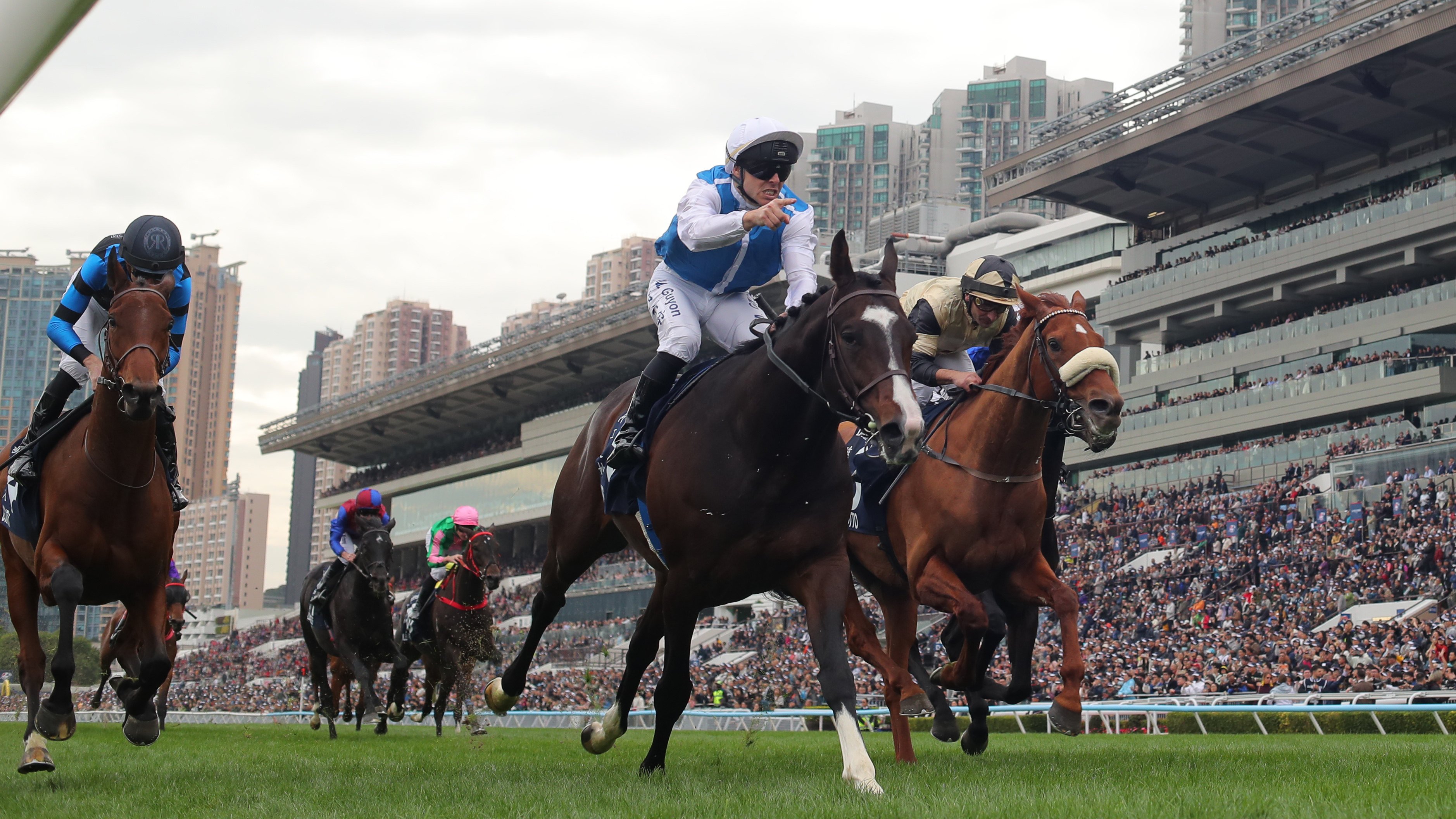 Sosie and Maxime Guyon win the Longines Hong Kong Vase. Photos: Kenneth Chan