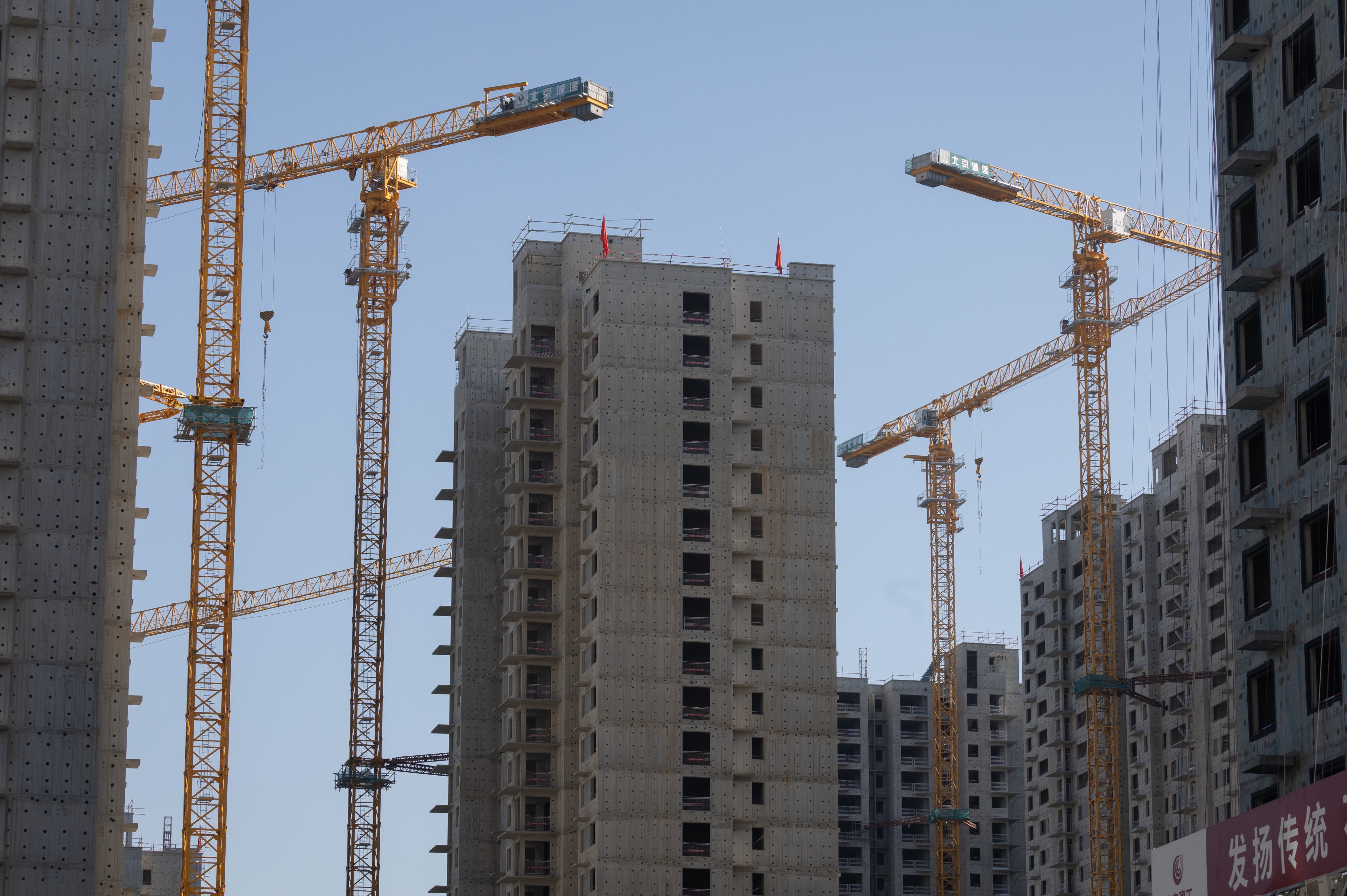 China’s top 100 developers sold homes worth 4.4 trillion yuan worth of homes last year. Photo: EPA
