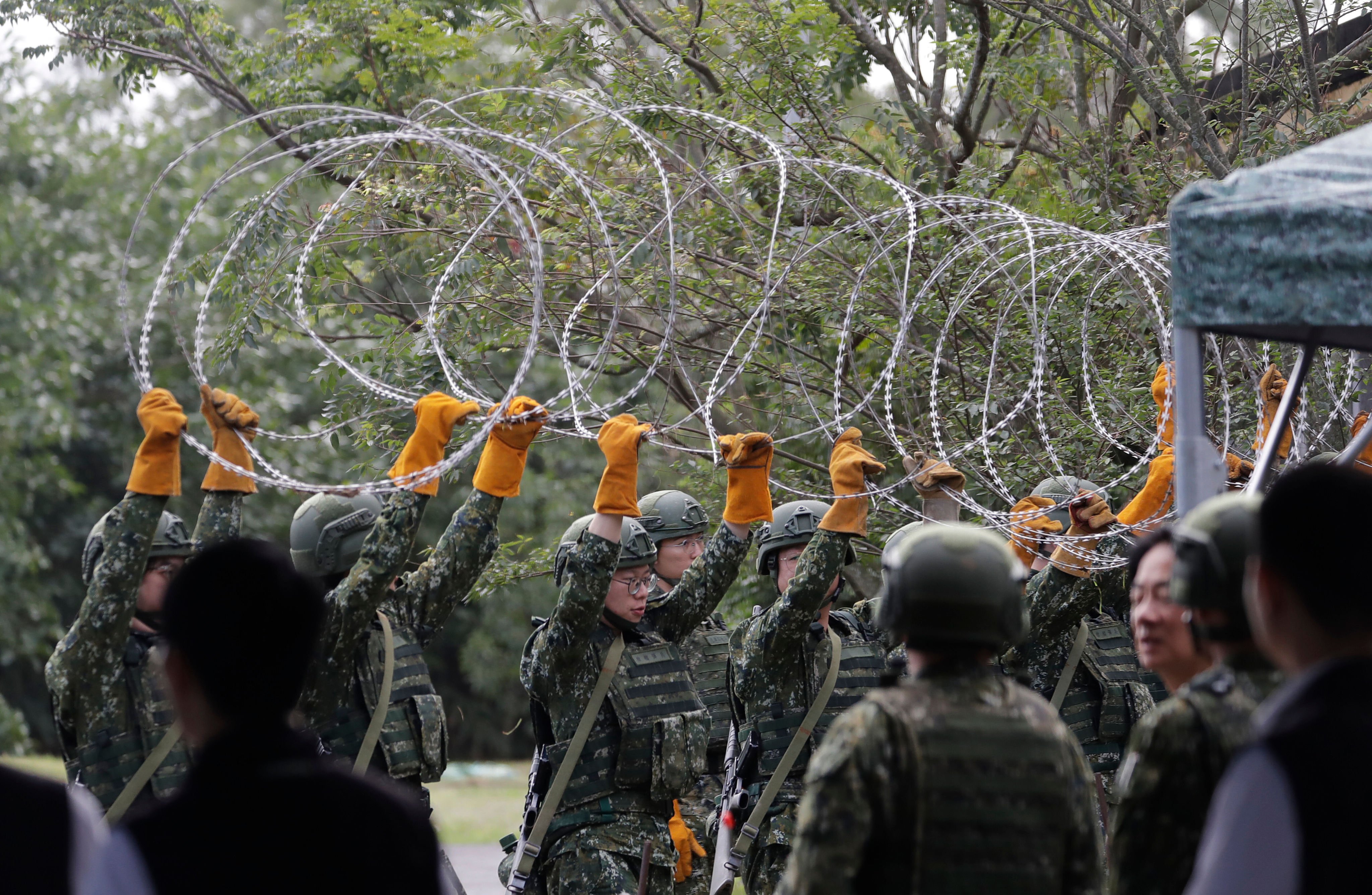 Taiwan reservists take part in military training on December 2. Photo: AP