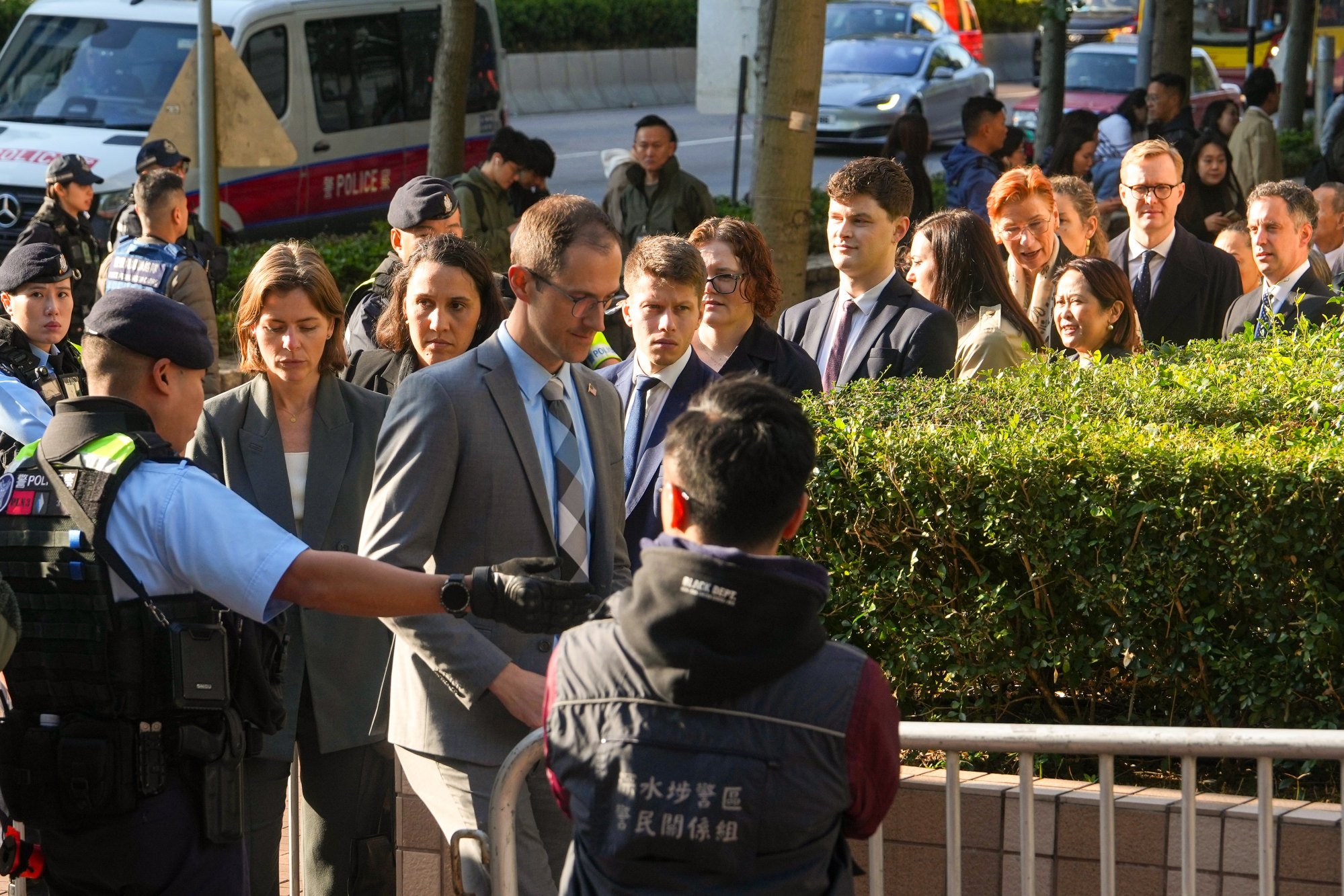 Representatives of various consulates arrive at the court. Photo: Sam Tsang