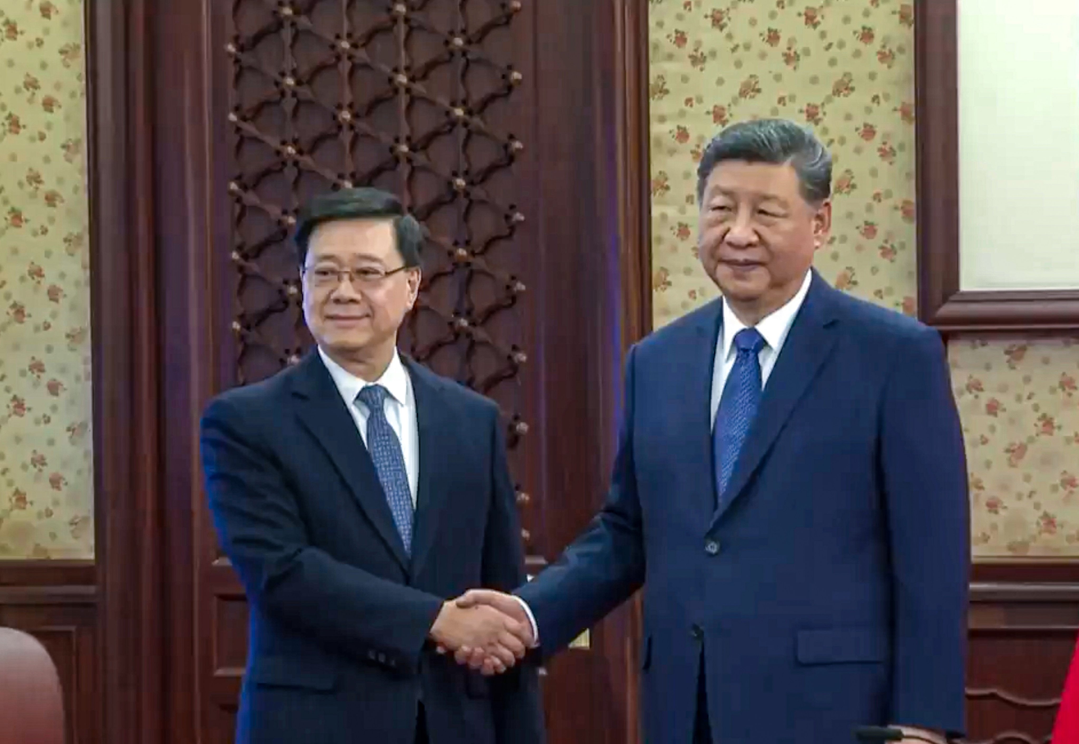 Chinese President Xi Jinping and Hong Kong Chief Executive John Lee in Beijing on Tuesday. Photo: RTHK