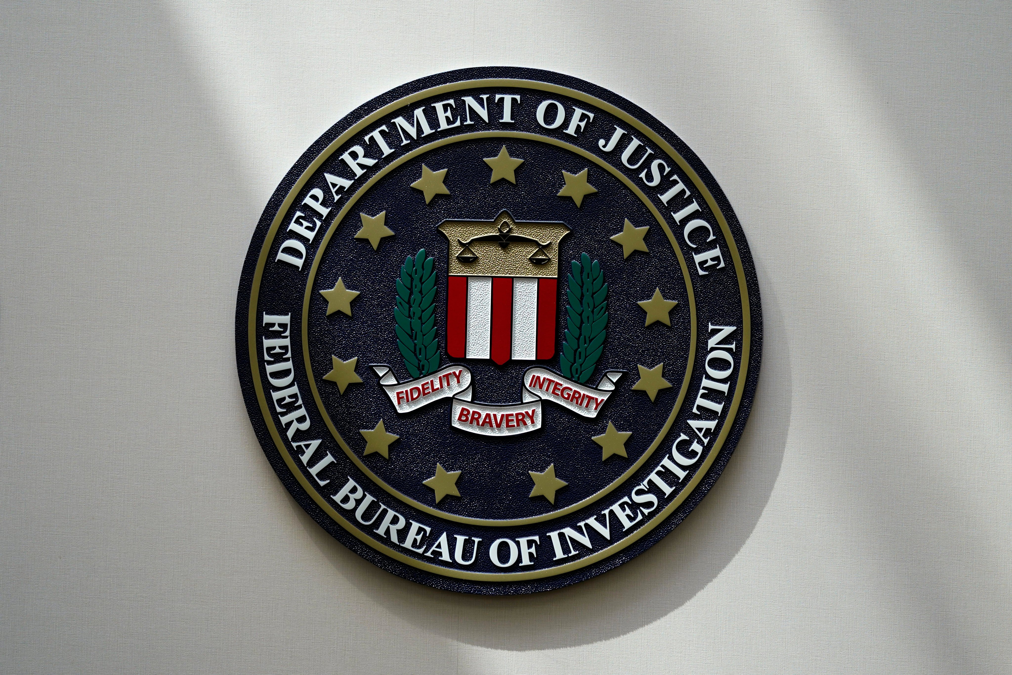 An FBI seal. The agency on Monday announced the arrests of four alleged members of an extremist group who are suspected of planning coordinated bombing attacks on New Year’s Eve across Southern California. Photo: AP