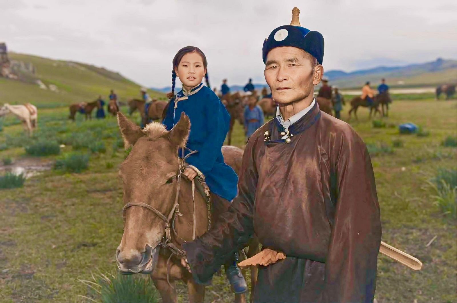 Horse rider Dolgorsuren Batoyun (centre) is pictured as a child. Now grown up, the first woman member of Mongolia’s national polo team looks back fondly on the “cultures and customs” her father (right) taught her. Photo: Dominique Backhouse