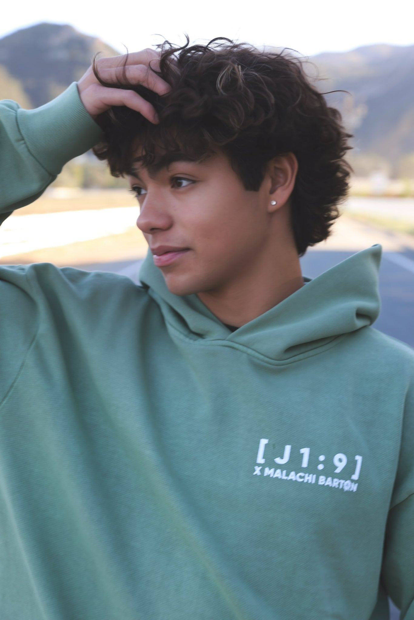 Malachi Barton modelling for his clothing brand J1:9. Photo: @MalachiDBarton/Instagram