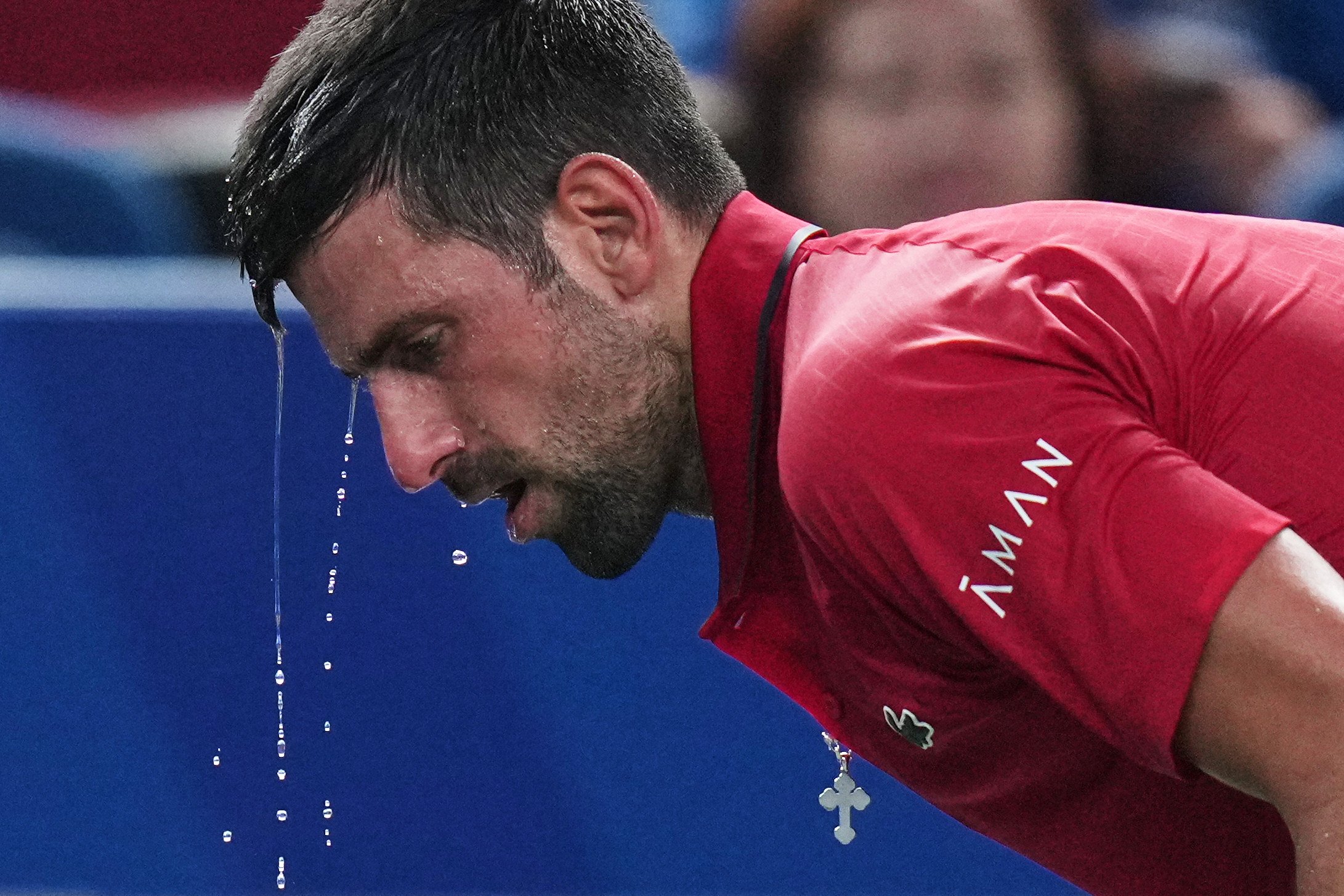 Novak Djokovic cools himself during a match at the Shanghai Masters in October. Photo: AP
