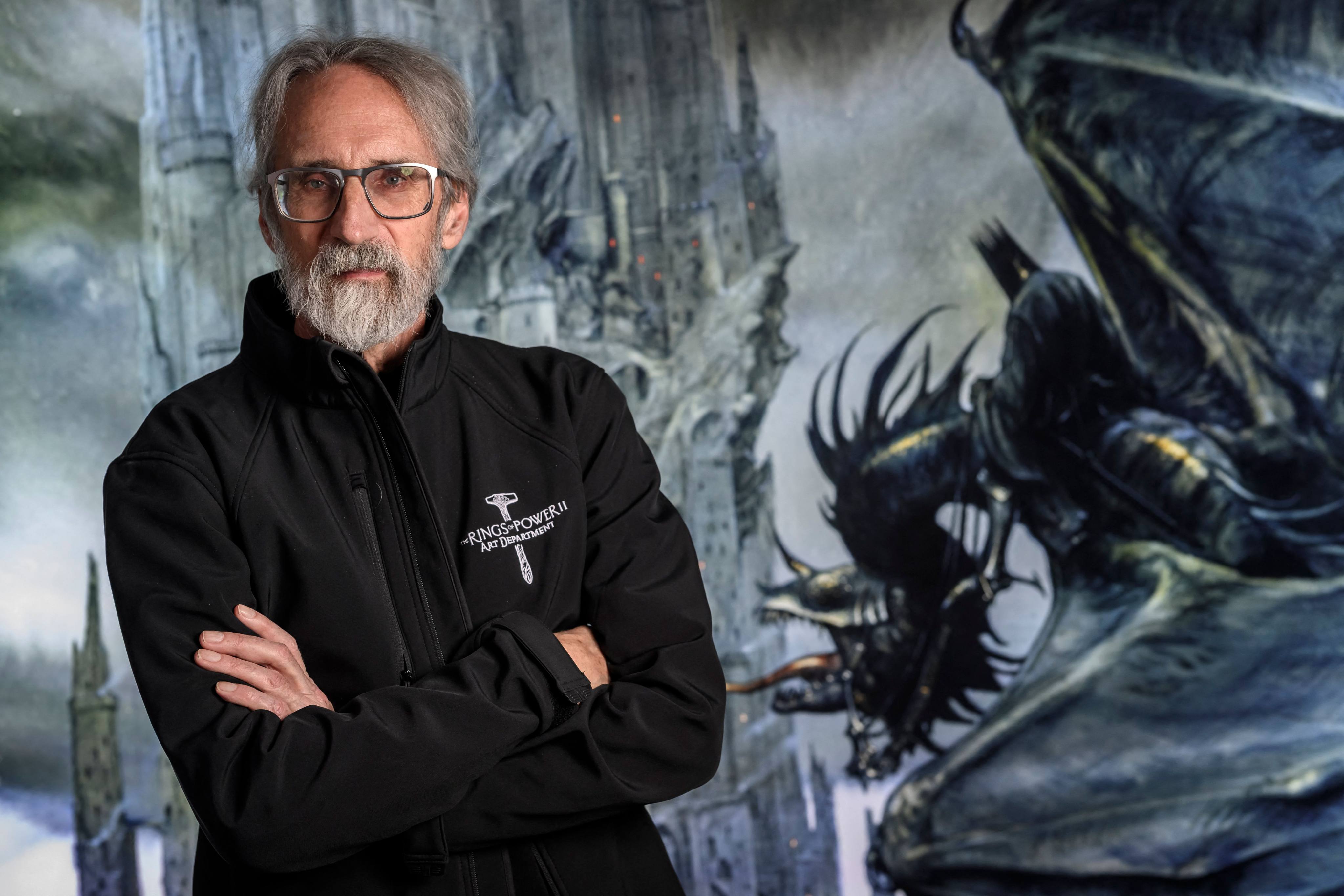 Illustrator John Howe poses at La Tour du Fantastique (“The Tower of Fantasy”), a new museum in Neuchâtel, western Switzerland, on December 9, 2025. The 68-year-old is famed for his interpretation of Tolkien’s literary work, which ultimately saw him serve as a concept artist on movie trilogies The Lord of the Rings and The Hobbit. Photo: AFP