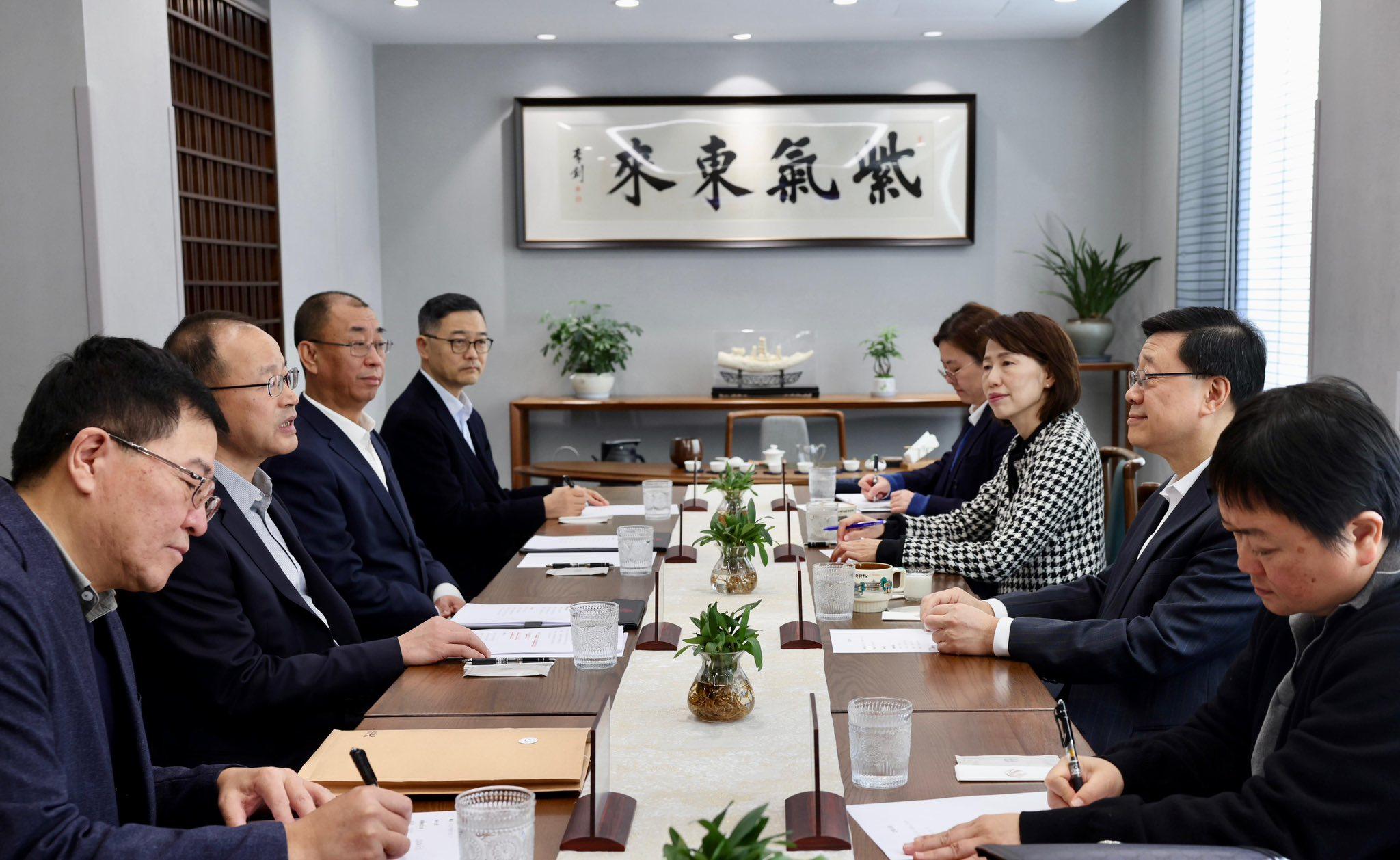 Chief Executive John Lee (second from right) meets with Peking University’s party secretary He Guangcai (second from left) on Wednesday. Photo: Facebook