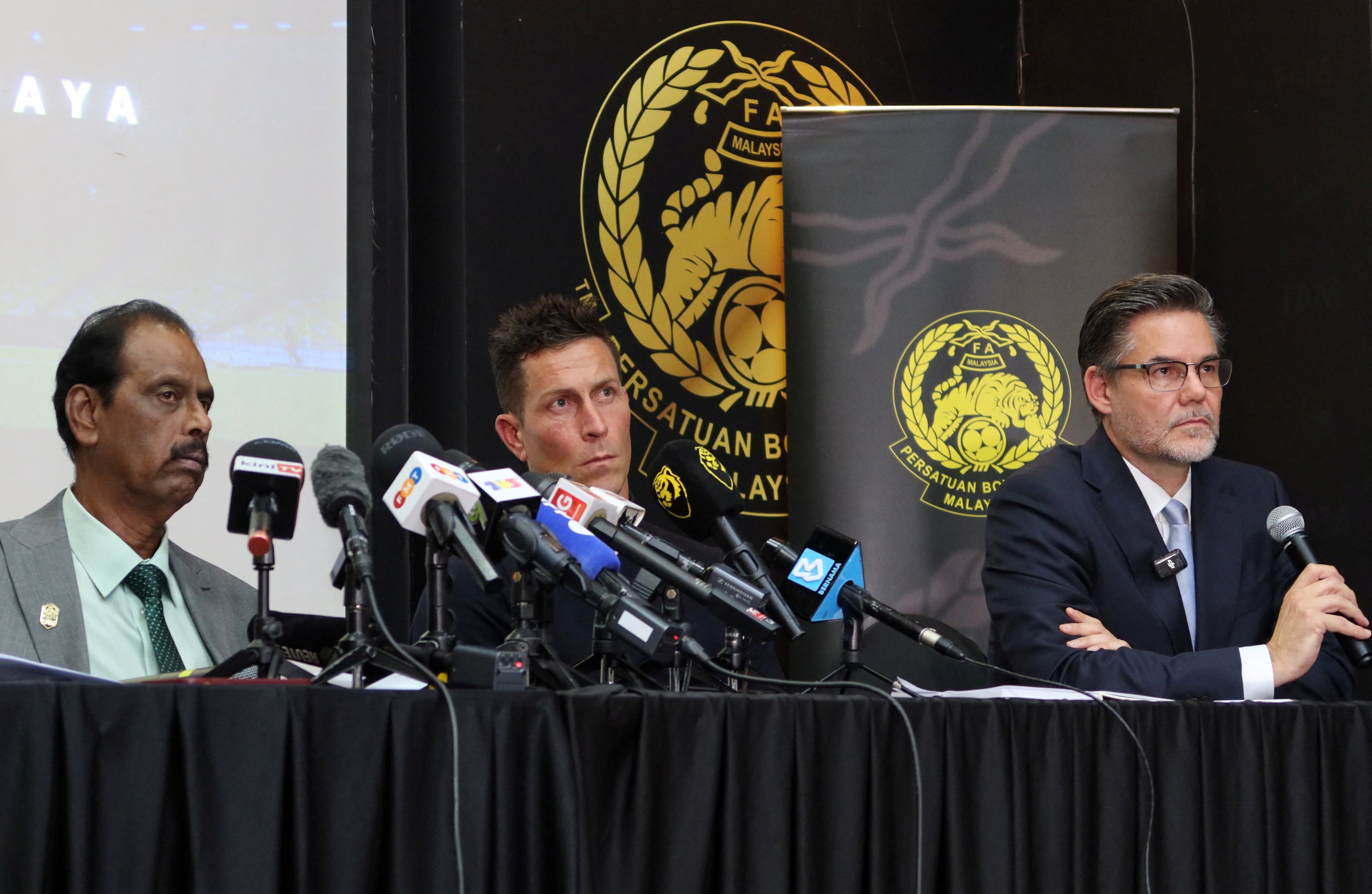 Football Association of Malaysia (FAM) vice-president S. Sivasundram, Malaysian national team CEO Rob Friend, and FAM legal counsel Serge Vittoz. Photo: Reuters