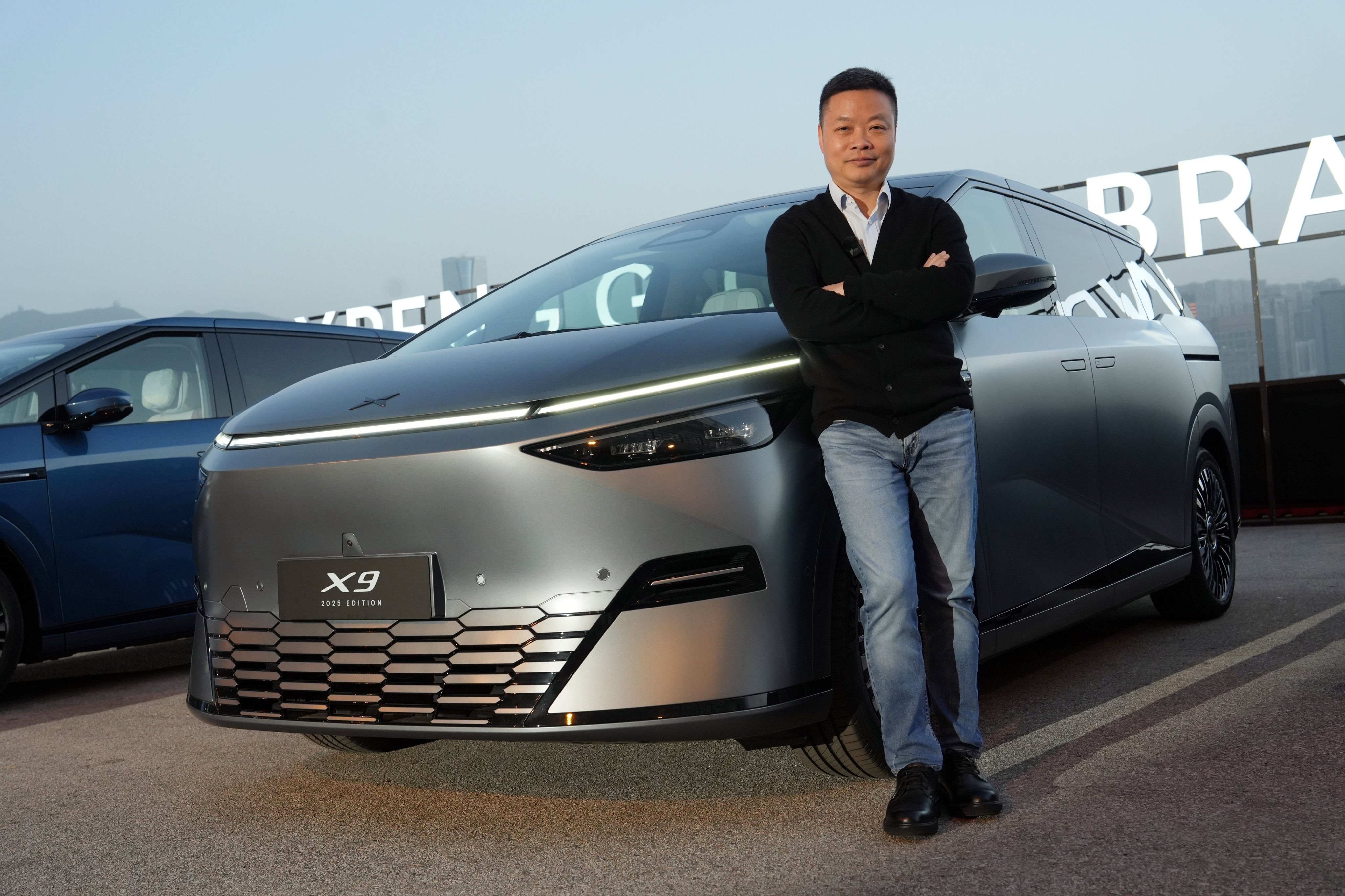 Xpeng CEO He Xiaopeng poses for a photograph at the Kai Tak Cruise Terminal in Hong Kong, April 14, 2025. Photo: Sun Yeung