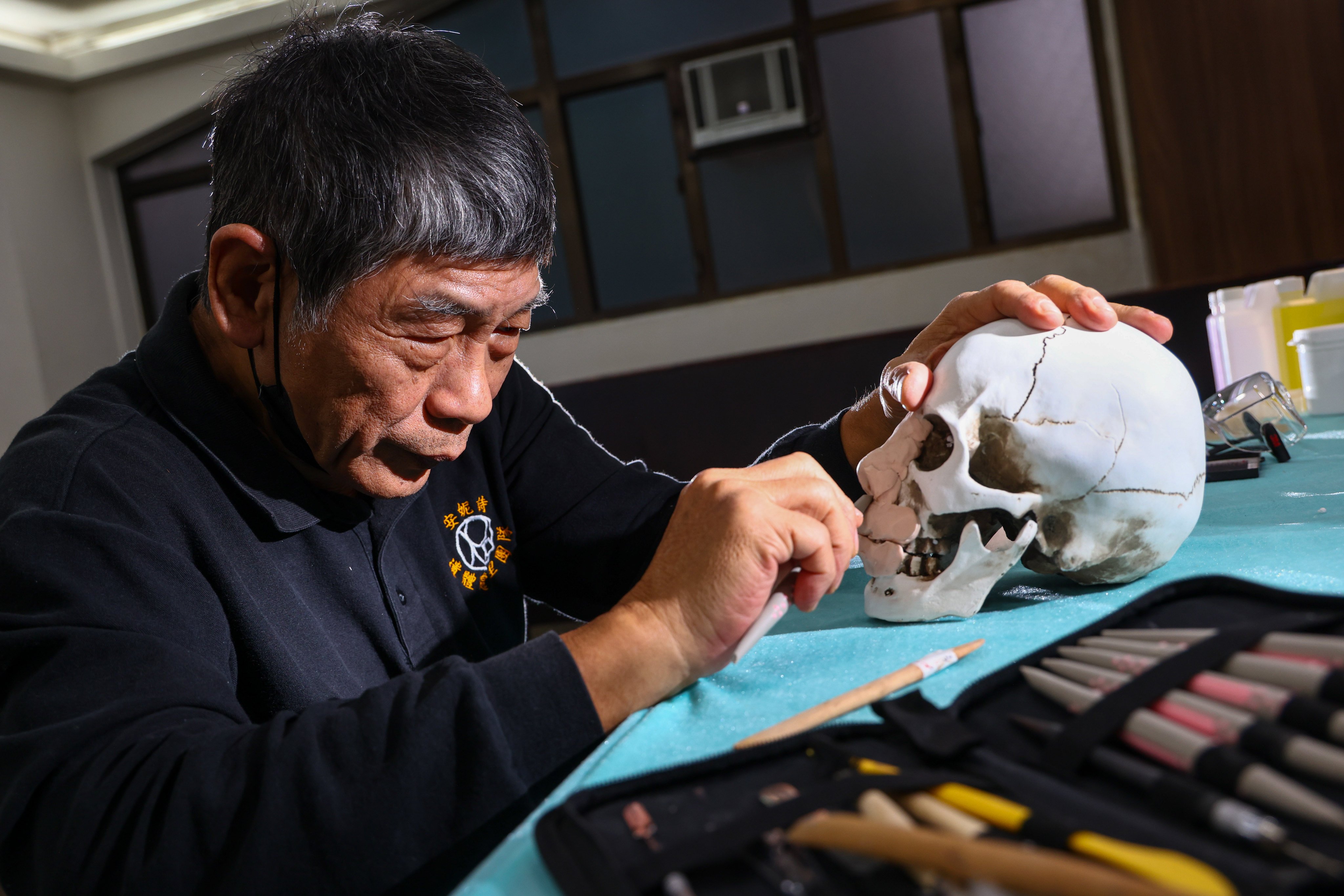 Taiwanese specialist Kuo Chang-chen and a team of experts are helping restore the bodies of the Tai Po fire victims. Photo: Dickson Lee