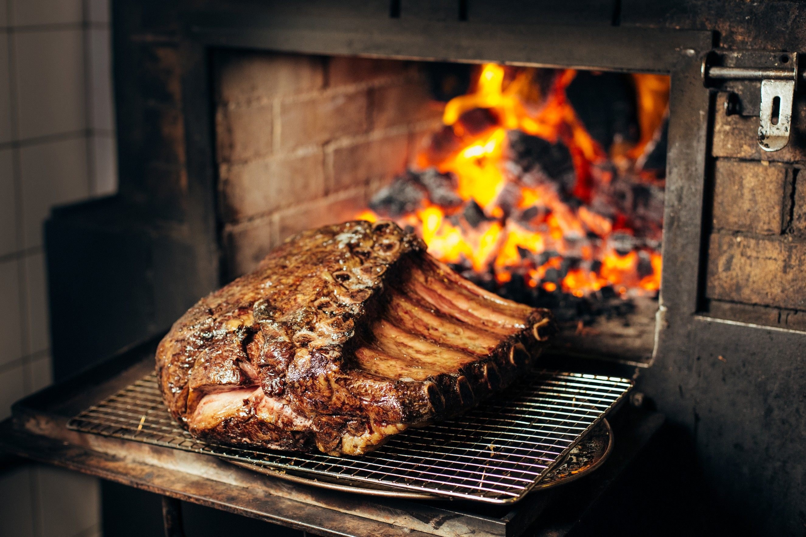 At Burnt Ends in Singapore, patrons can enjoy wood-fired meat such as 75-day dry-aged Wagyu. Photo: Simon Pynt