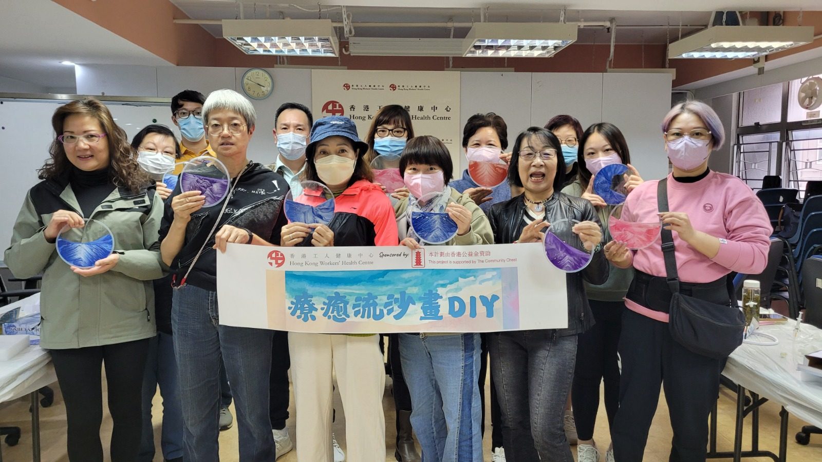 A group of injured workers show off their creations in a sand art therapy workshop held at Hong Kong Workers’ Health Centre. Photo: Hong Kong Workers’ Health Centre