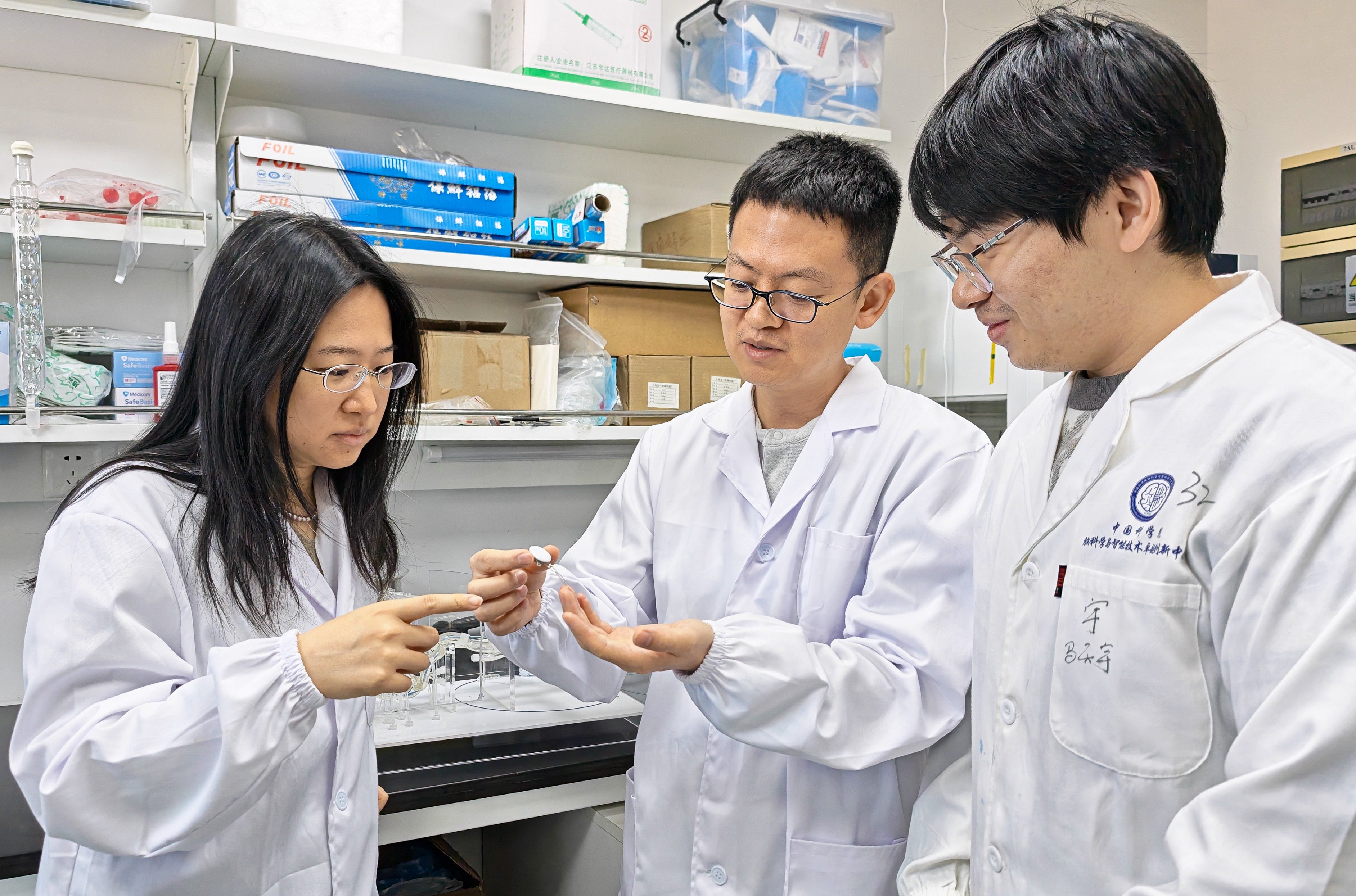 Chinese scientists have had a huge breakthrough in brain-computer interfacing technology, allowing a paralysed man to control smart wheelchairs and robotic dogs with his mind. Photo: Handout