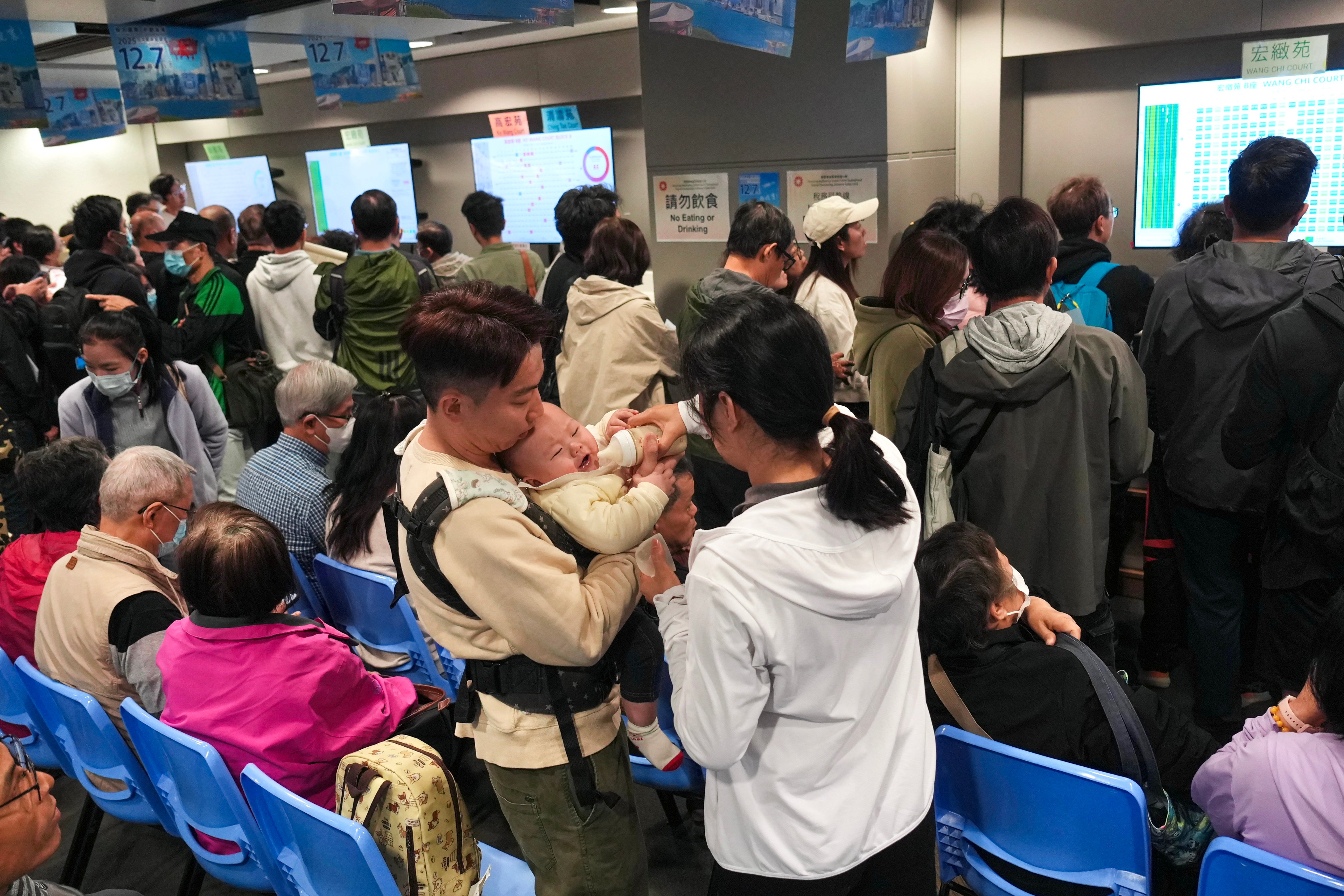 Eligible applicants begin selecting flats under the Housing Authority’s Green Form Subsidised Home Ownership Scheme at the sales office in Kwun Tong on November 26. Photo: Karma Lo