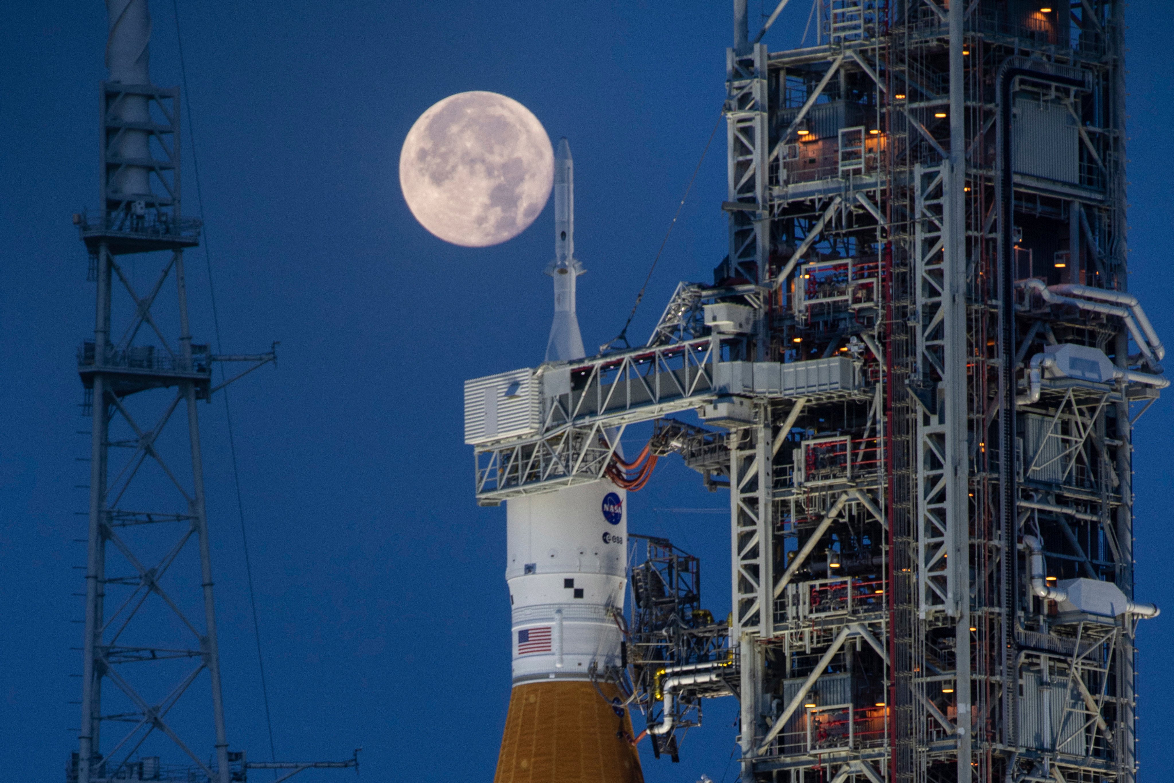 A full moon is seen behind the Artemis I Space Launch System and Orion spacecraft at Nasa’s Kennedy Space Centre in Florida in June 2022. Photo: Nasa via AP