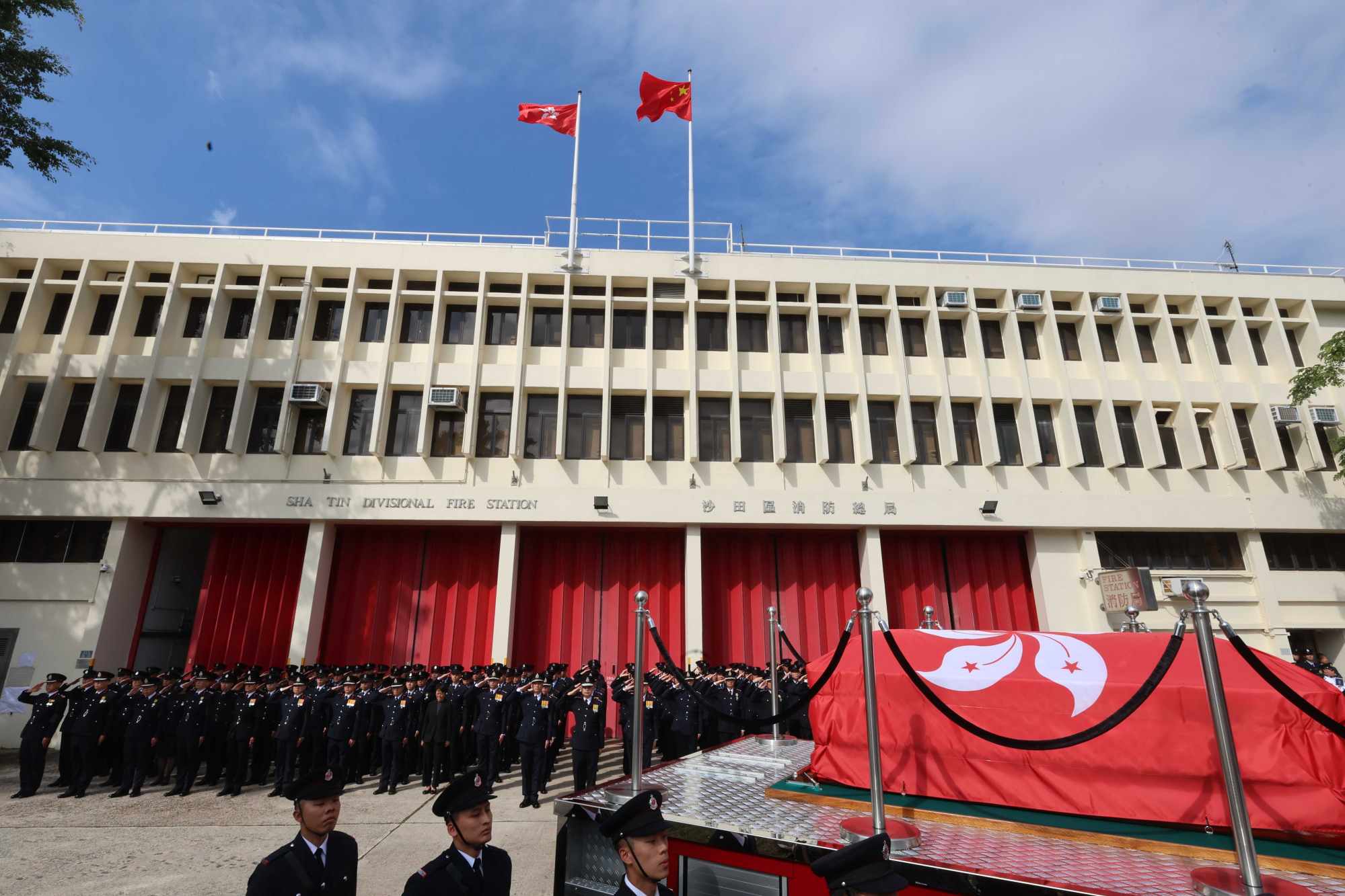 The hearse for fallen firefighter Ho Wai-ho at Sha Tin Fire Station, where he had previously served. Photo: Edmond So The hearse for fallen firefighter Ho Wai-ho at Sha Tin Fire Station, where he had previously served. Photo: Edmond So