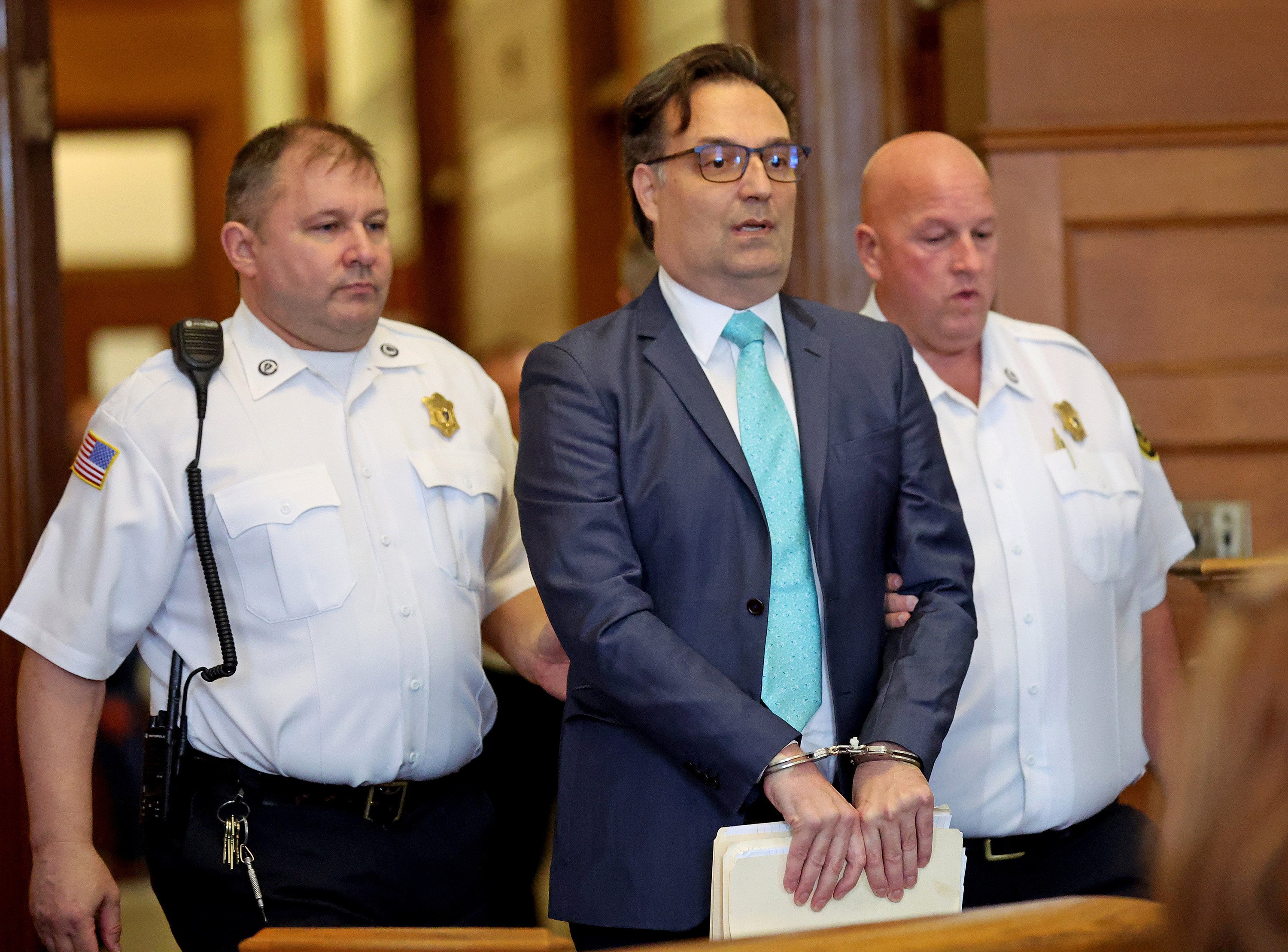 Brian Walshe is led into a hearing in Dedham, Massachusetts, in October 2024. Photo: TNS