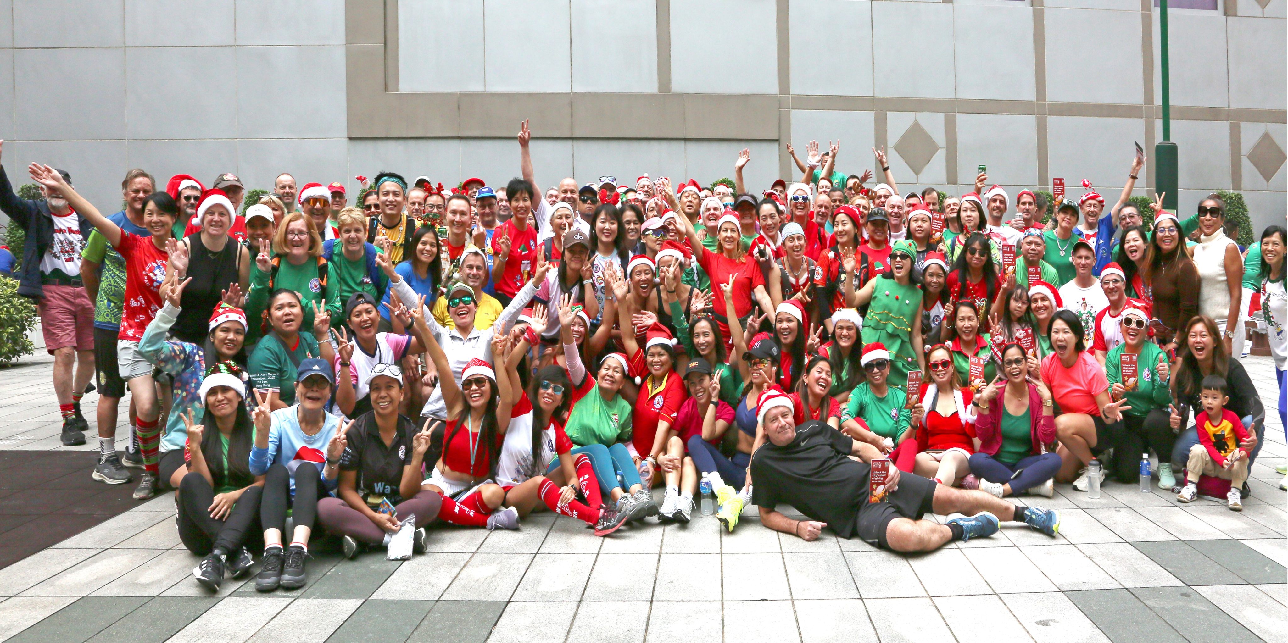Festively dressed participants hit the streets to take part in the annual Santa Hash charity run. Photo: Handout