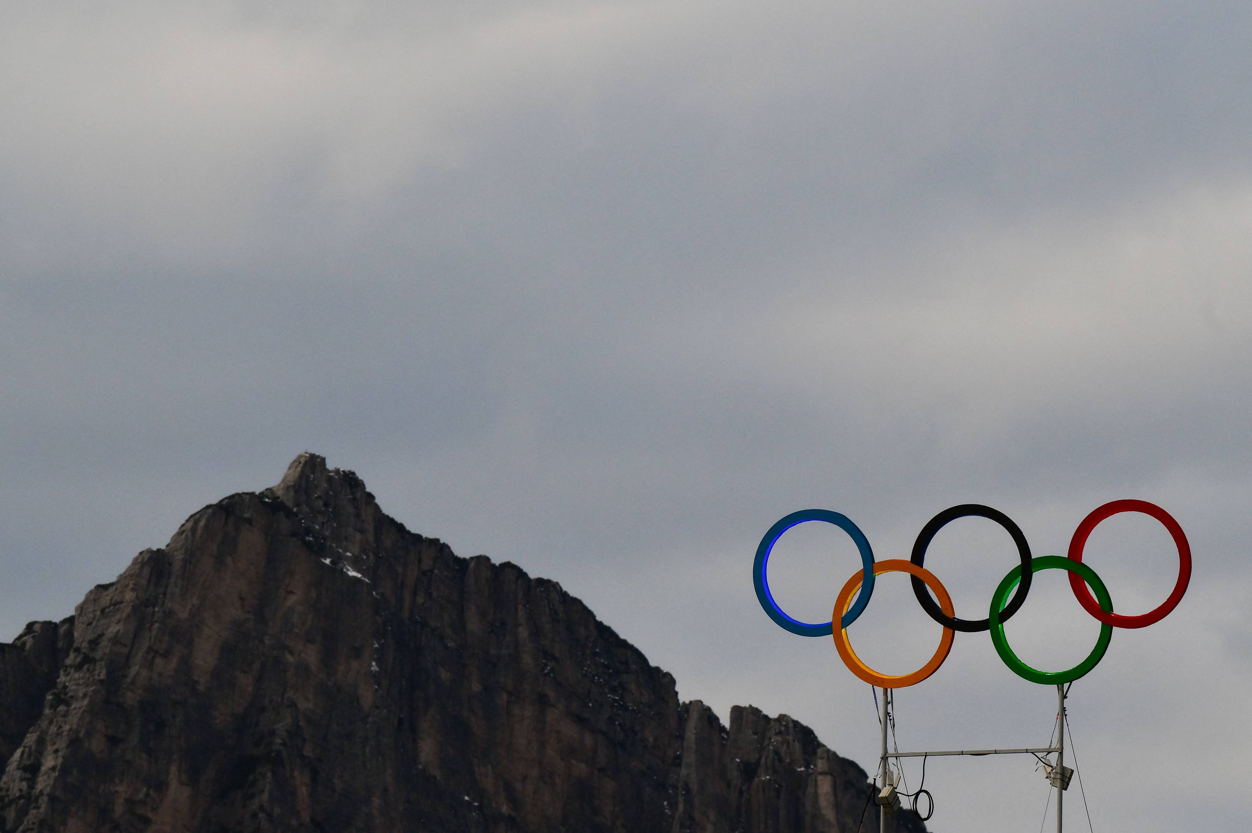 The Olympic rings over the Curling Olympic Stadium, venue for the events at the Milano Cortina Games in February. Photo: AFP