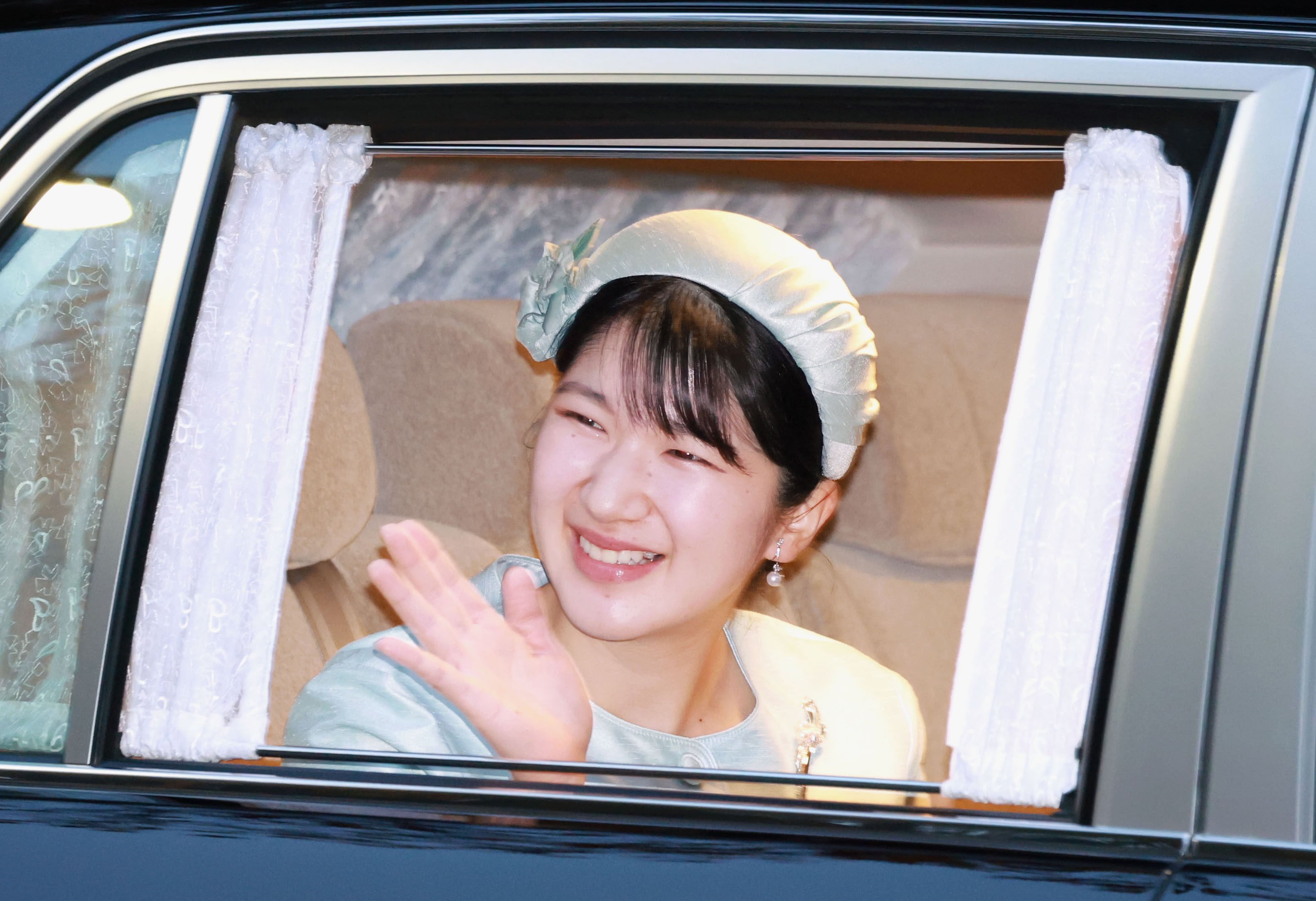 Japanese Princess Aiko arrives at the Akasaka Estate in Tokyo to greet former emperor Akihito and former empress Michiko on her 24th birthday on December 1. Photo: Kyodo