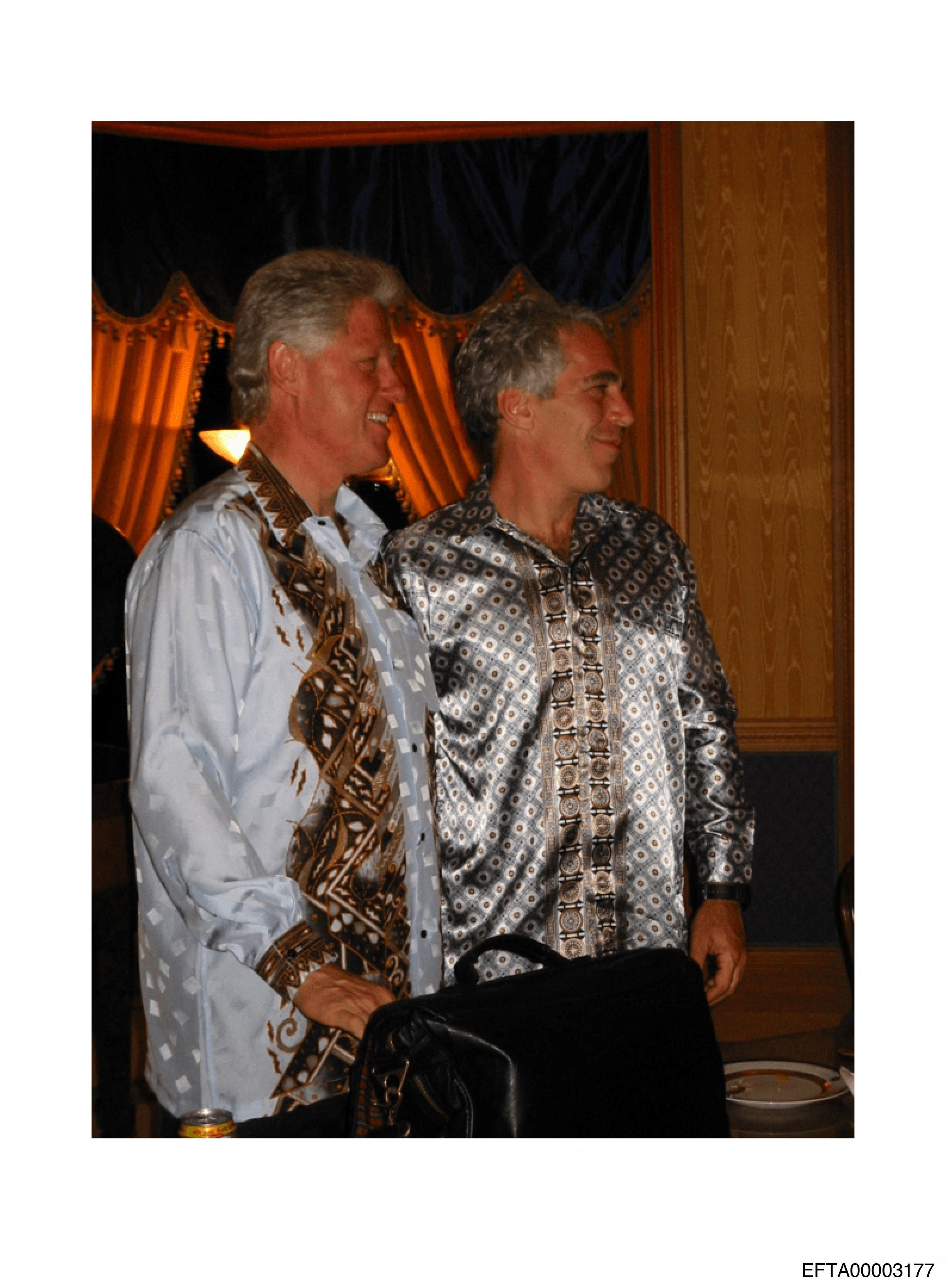 Former US President Bill Clinton stands with Jeffrey Epstein in this image released on Friday. Photo: US Department of Justice via Reuters