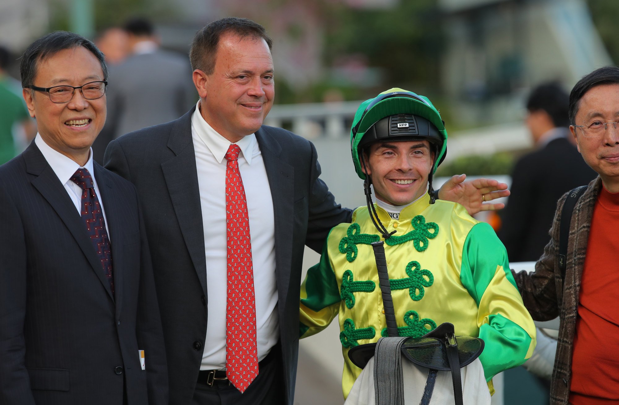 Caspar Fownes (second left) and jockey Maxime Guyon celebrate Sky Trust’s success.