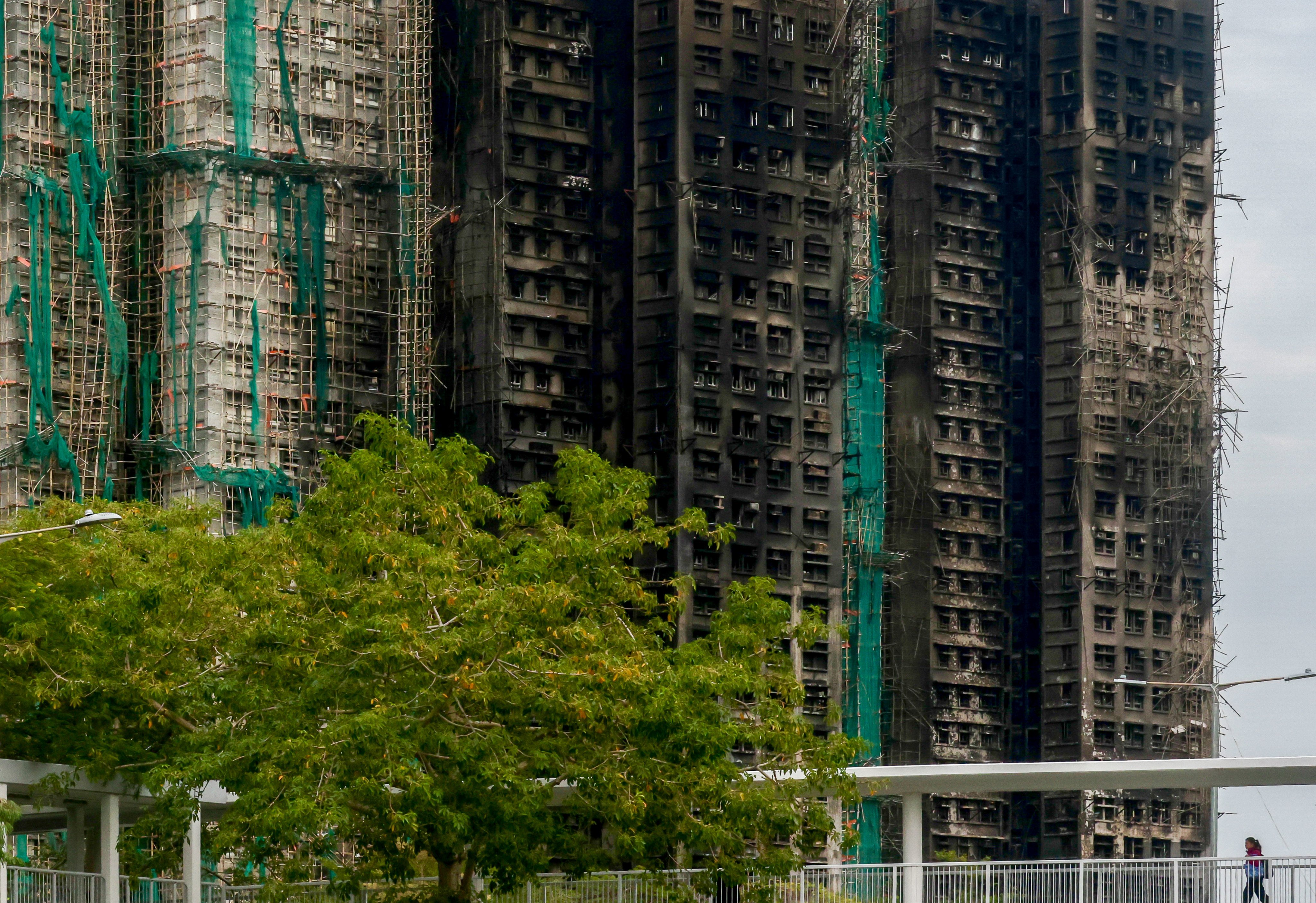 Hong Kong will provide an annual subsidy of HK$150,000 to each flat owner affected the Tai Po blaze, to help them rent homes in the private market. Photo: Jonathan Wong