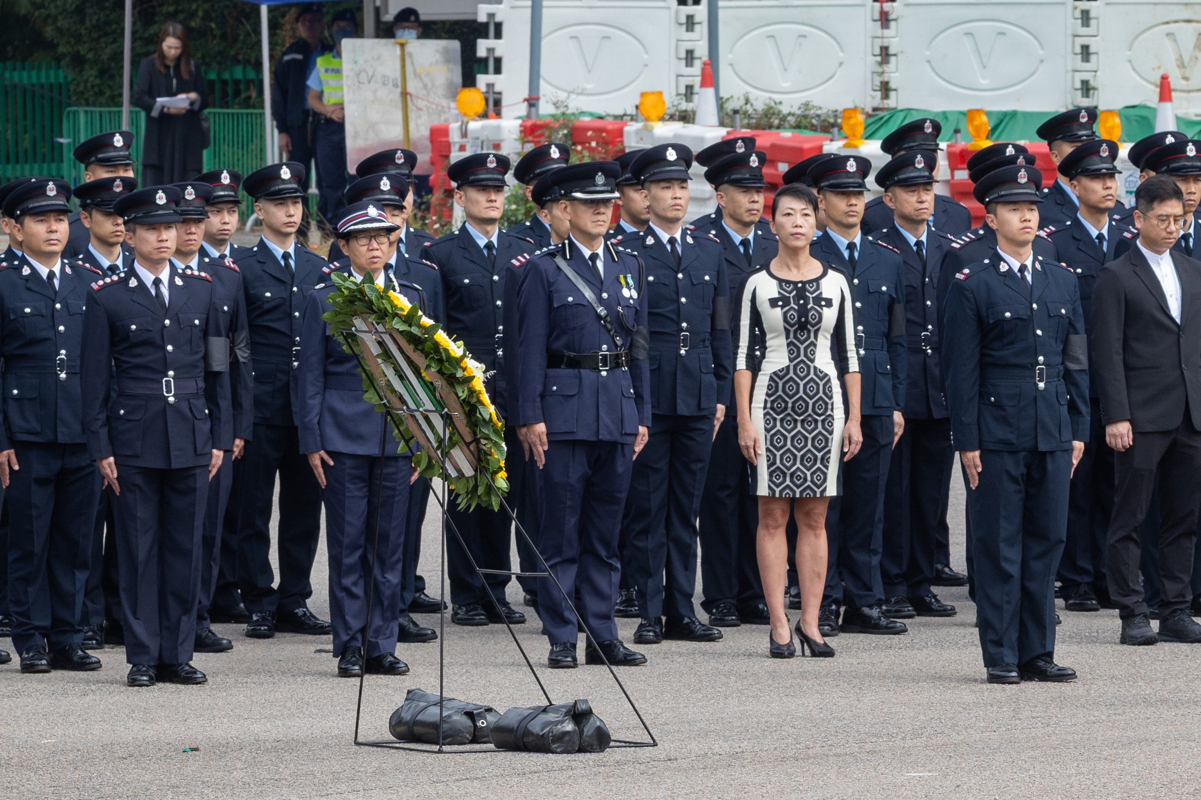 District officer Eunice Chan expressed regret over her clothing choice at the funeral service for firefighter Ho Wai-ho. Photo: Dickson Lee