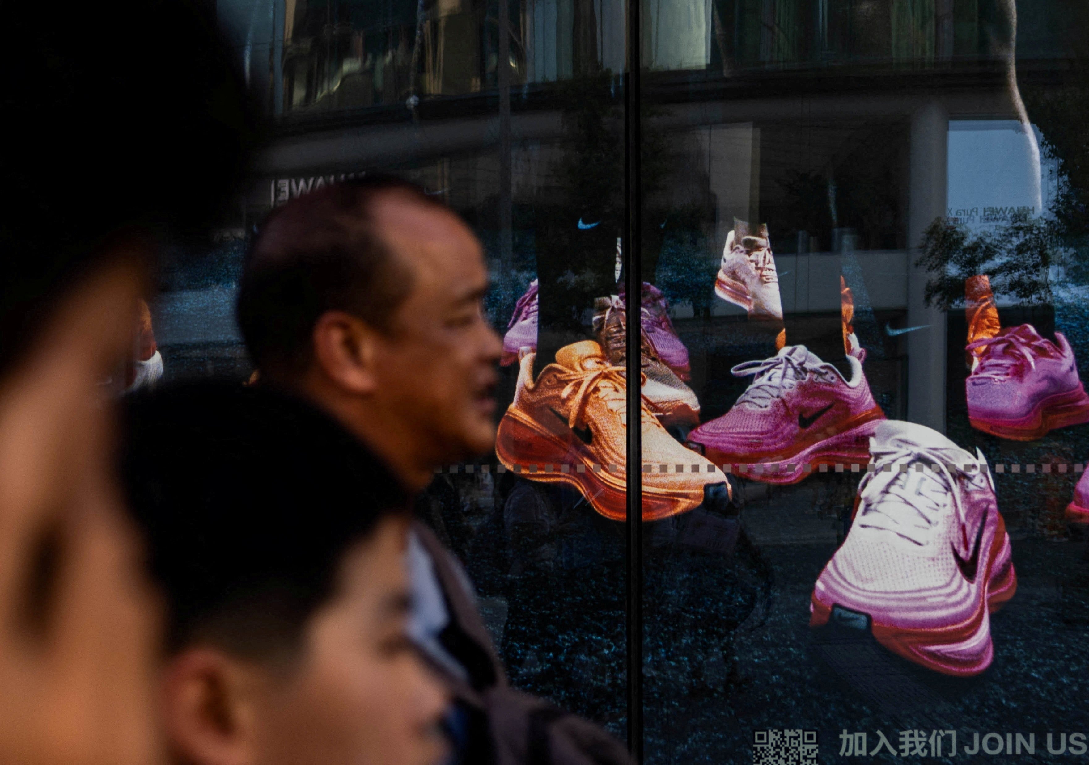 Walk on by: changing tastes and the growing allure of home-grown brands mean that sports apparel giants like Nike are struggiing in China. Photo: Reuters