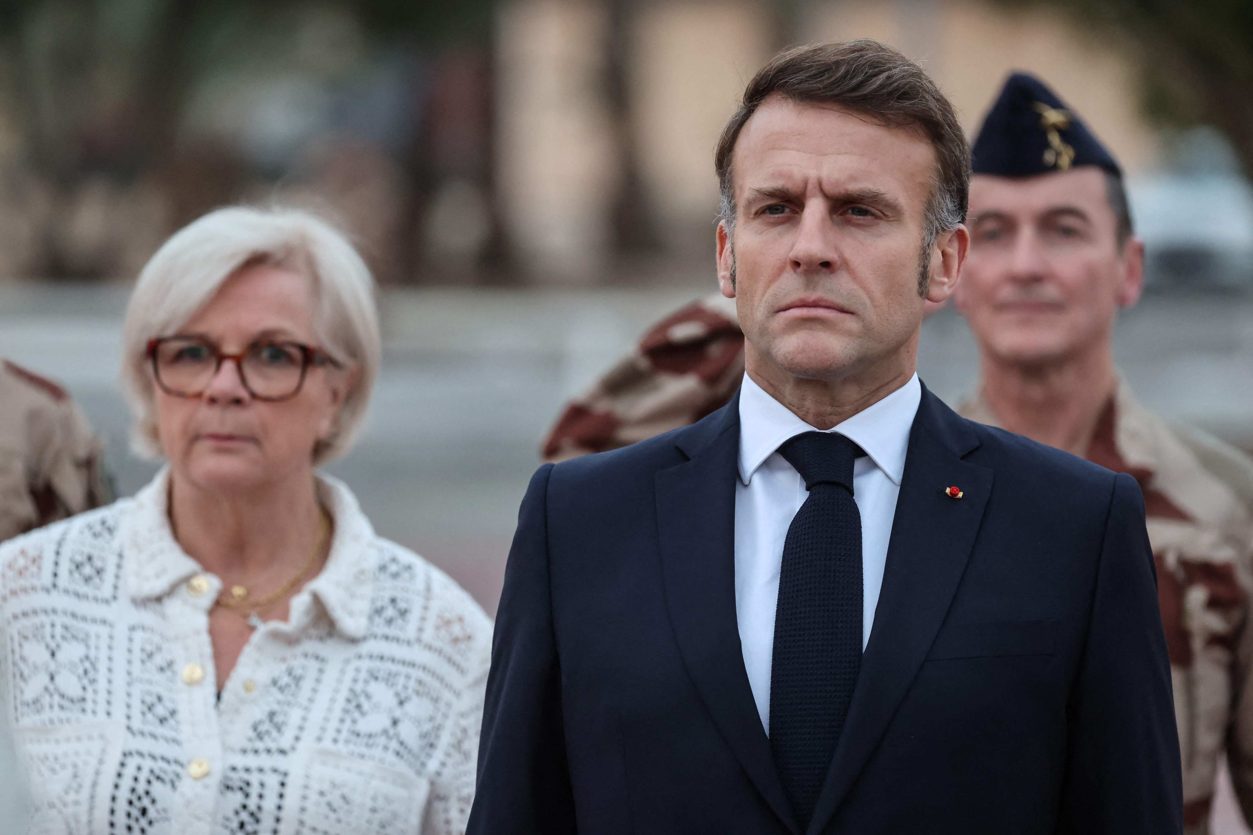 France’s President Emmanuel Macron and France’s Defence Minister Catherine Vautrin (L) review French troops during a military ceremony at the 5th Cuirassier Regiment’s base in Zayed Military City, near Abu Dhabi, on  Sunday. Photo: AFP