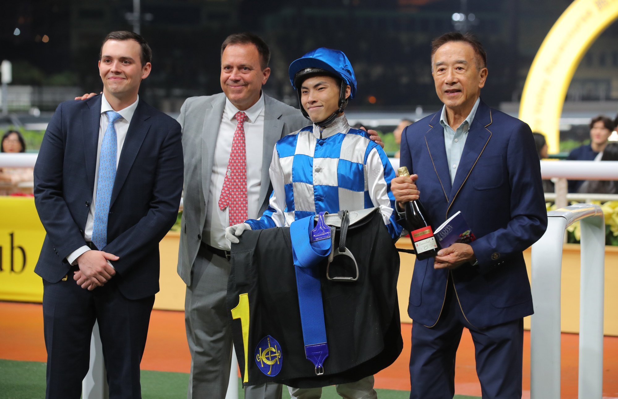 From left to right, Ronan Fownes, his father Caspar, apprentice Ellis Wong and owner James Tien Pei-chun celebrate Sugar Sugar’s win.