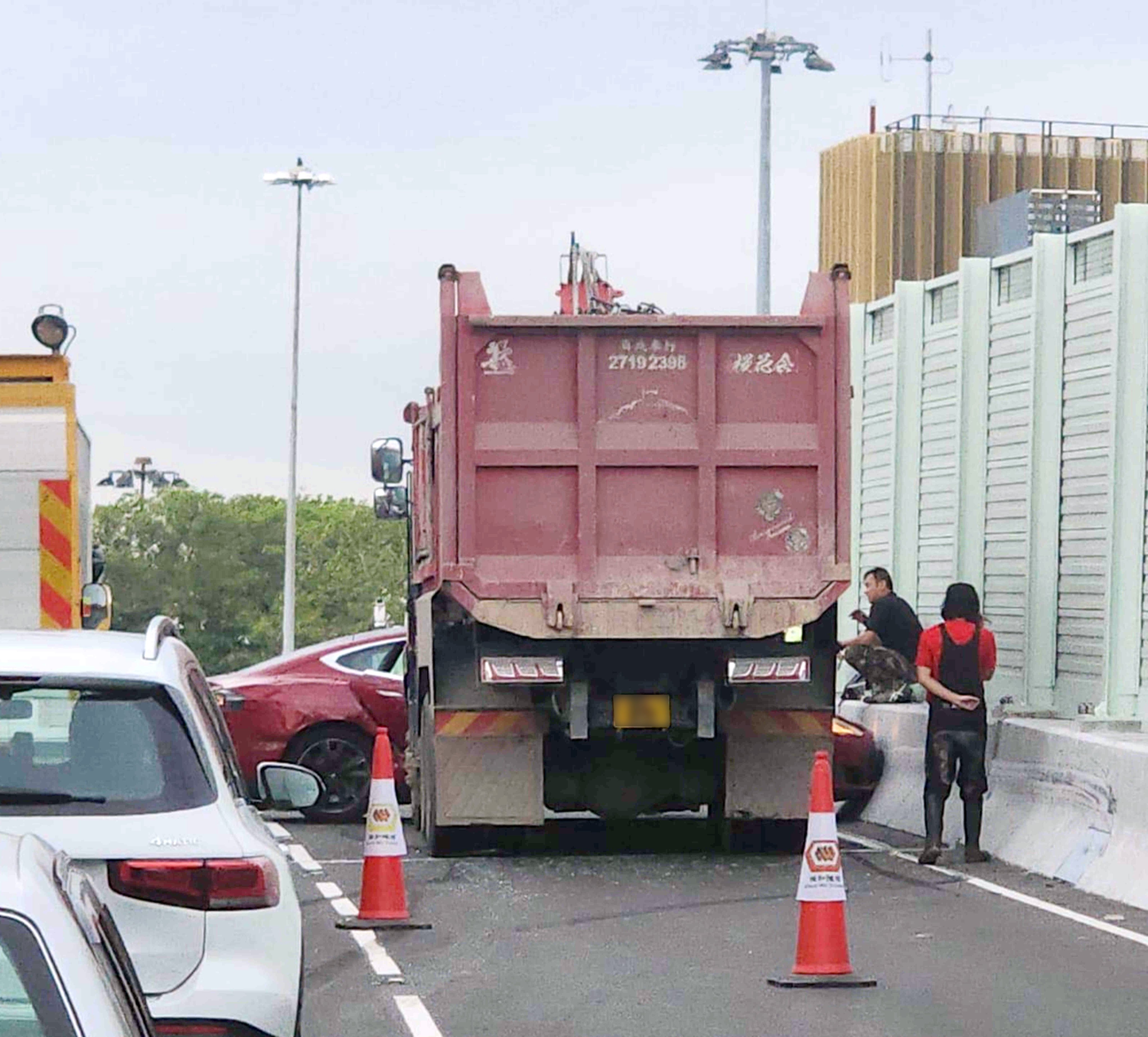 A medium-sized truck and a car collided while both vehicles were heading west towards Kwai Chung. Photo: Handout