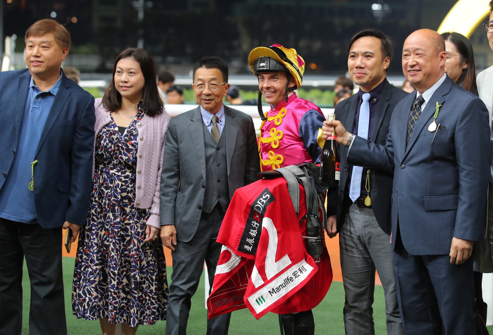 Trainer Me Tsui (third from left), jockey Maxime Guyon and connections of The Auspicious are all smiles.