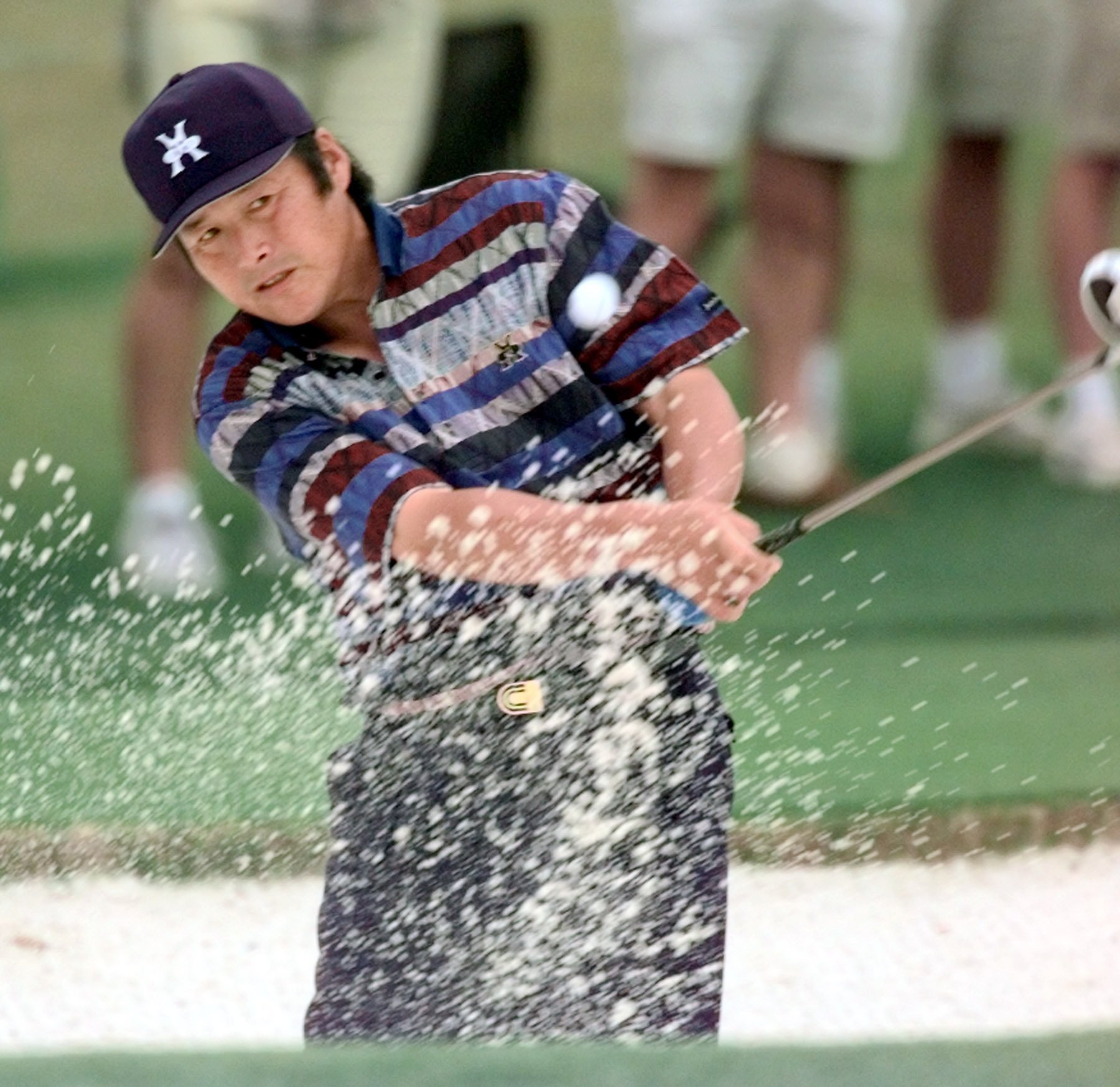 Masashi ‘Jumbo’ Ozaki, blasts out of the sand on the second hole at Augusta National during the second round of the 1999 Masters. Photo: AP