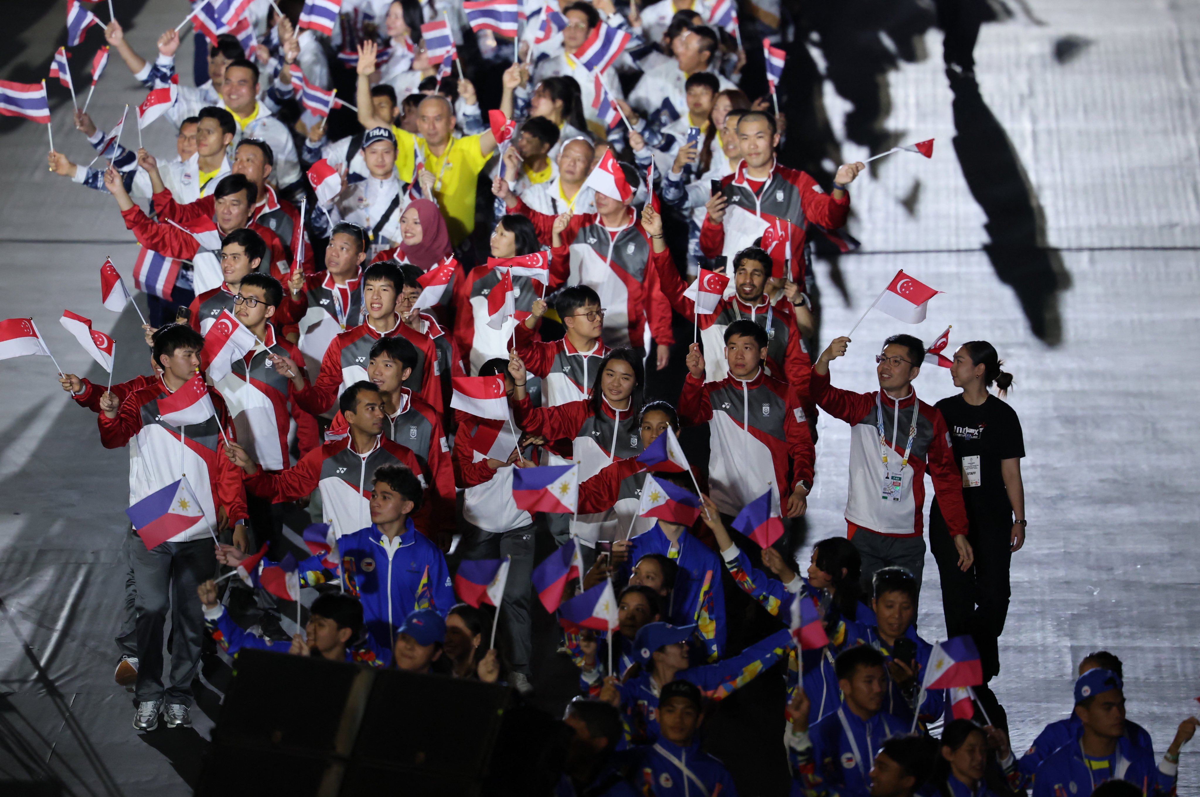 Team Singapore marches during the parade of athletes at the SEA Games’ closing ceremony in Bangkok on Saturday. Photo: Reuters