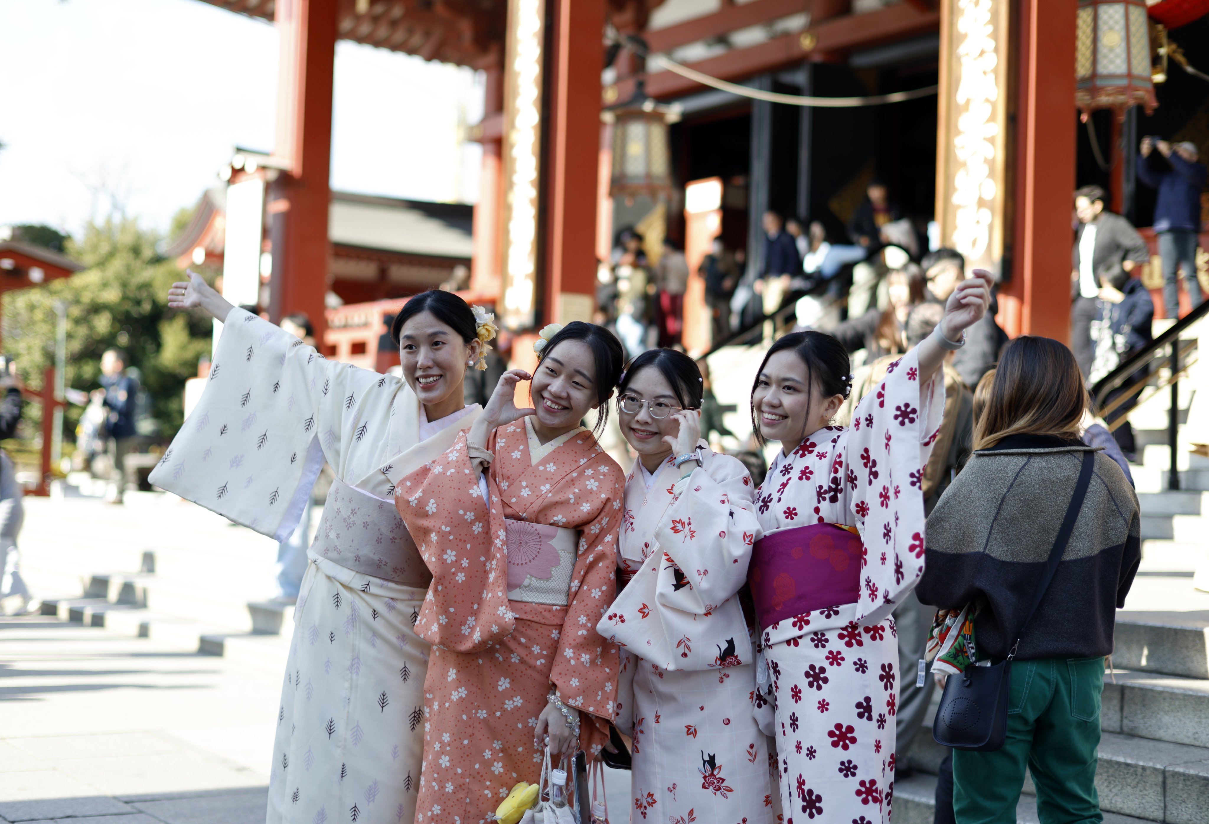 Visitors in traditional outfits visit the Sensoji Temple in the Asakusa district in Tokyo. Photo: EPA