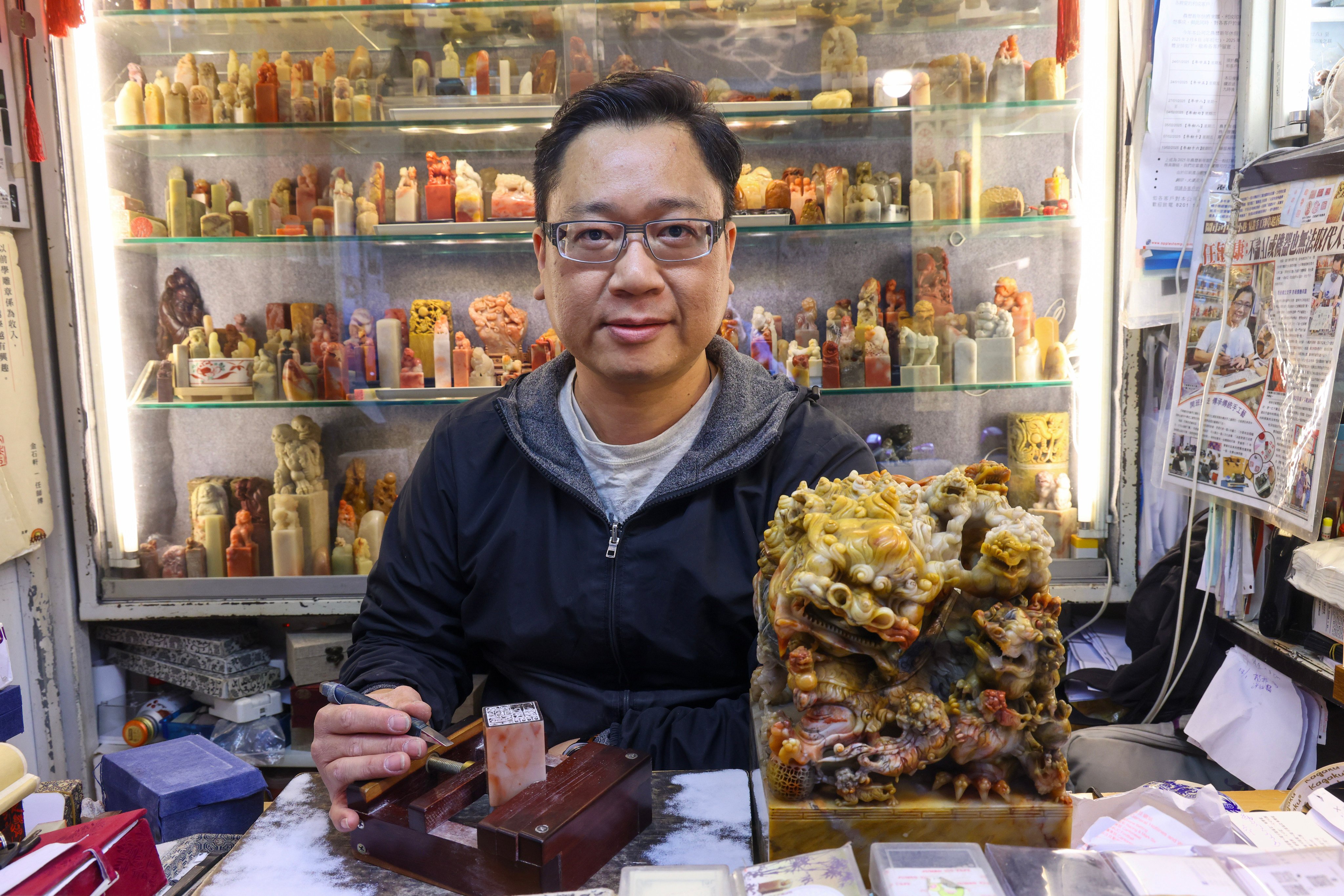 Yam Man-hong, at Kingstone Engraving, is one of the very few remaining stone seal carvers in Hong Kong. His story is one of seven highlighted Post stories of 2025 that celebrated Chinese culture. Photo: Dickson Lee