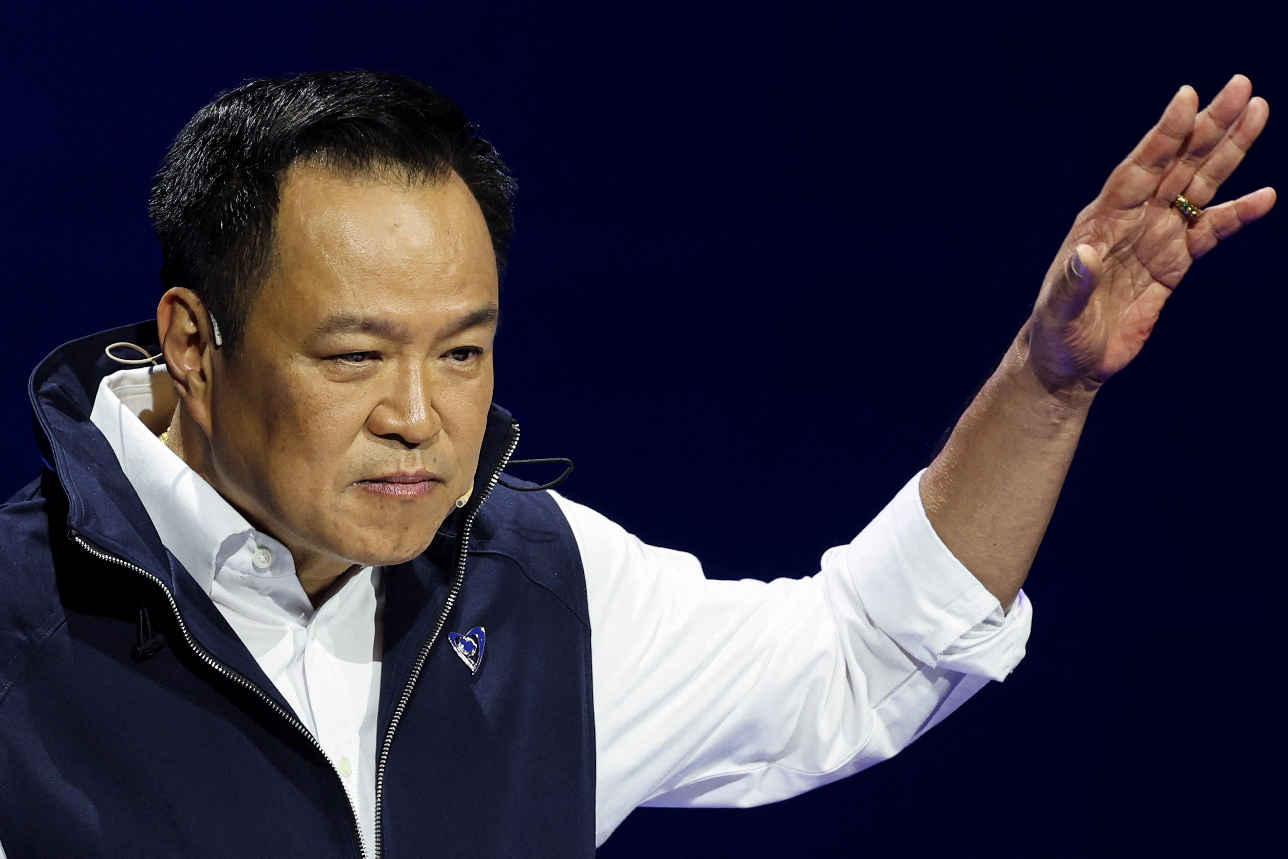 Thailand’s caretaker PM Anutin Charnvirakul reacts at a Bangkok event on Wednesday while unveiling policies ahead of February’s general election. Photo: Reuters